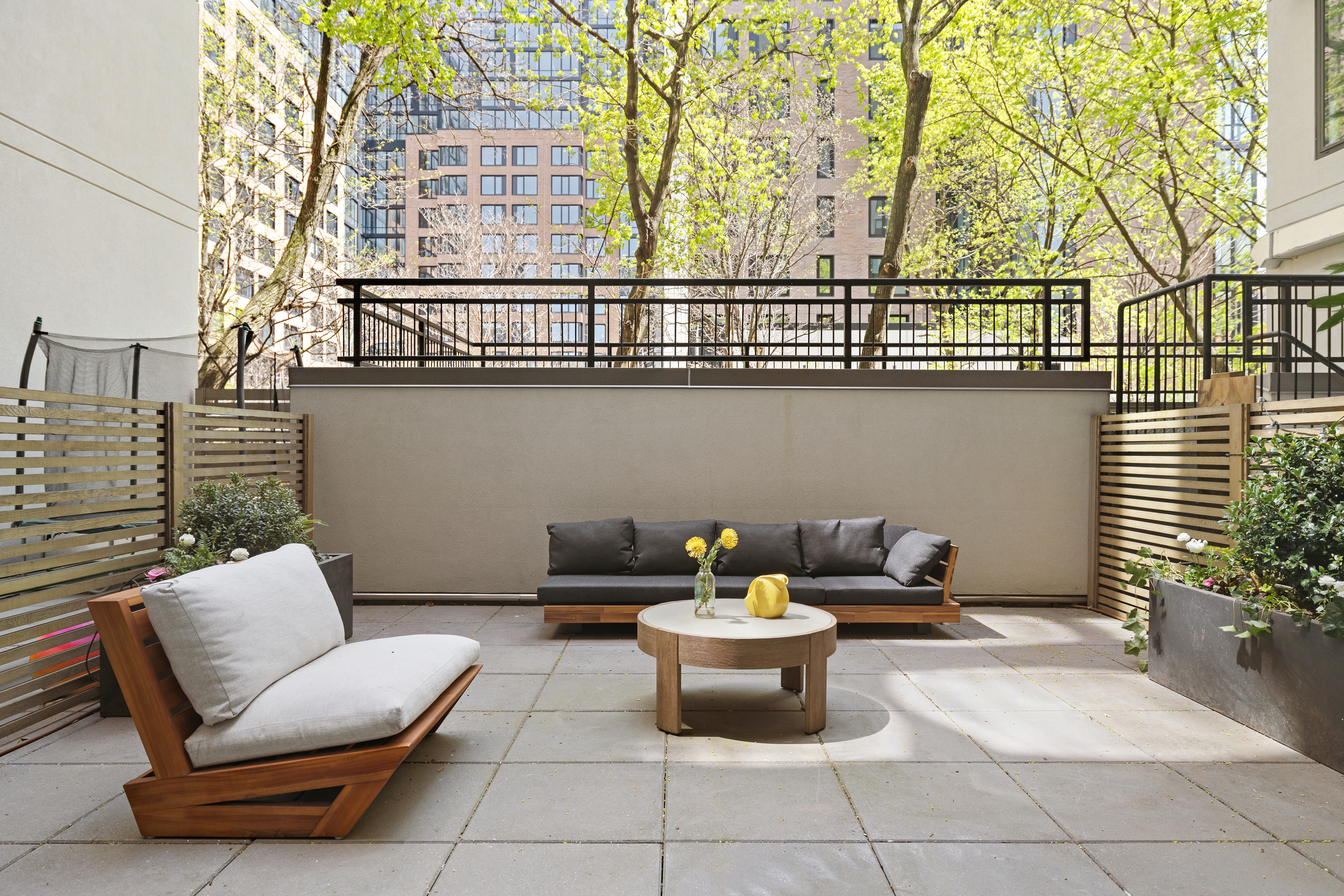 111 Montgomery Street, Unit 1C Brooklyn, NY 11225 - Photo 7 of 15 a view of a patio with couches and potted plants
