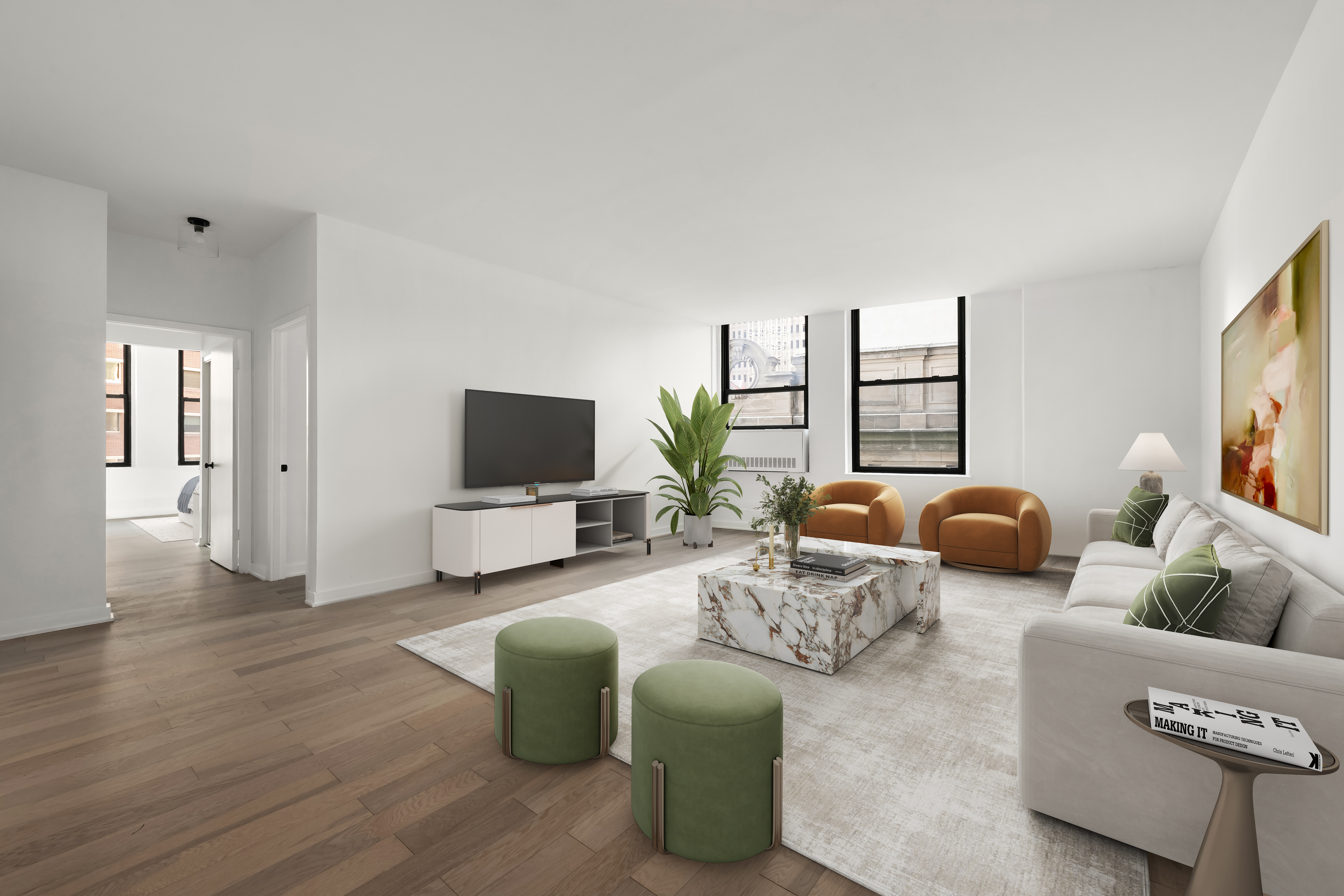 a living room with furniture and a flat screen tv