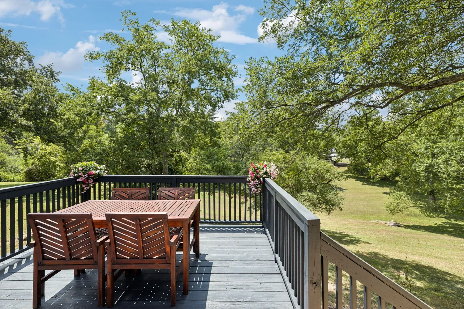 a view of a yard with an outdoor space
