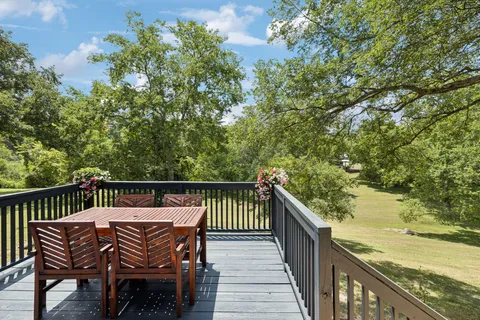 a view of a yard with an outdoor space