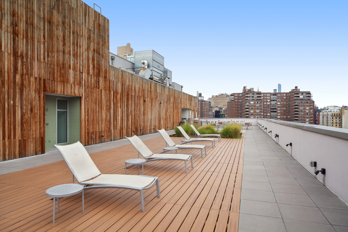 420 West 25th Street, Unit 3B Manhattan, NY 10001 - Photo 8 of 15 a view of a patio with a table and chairs