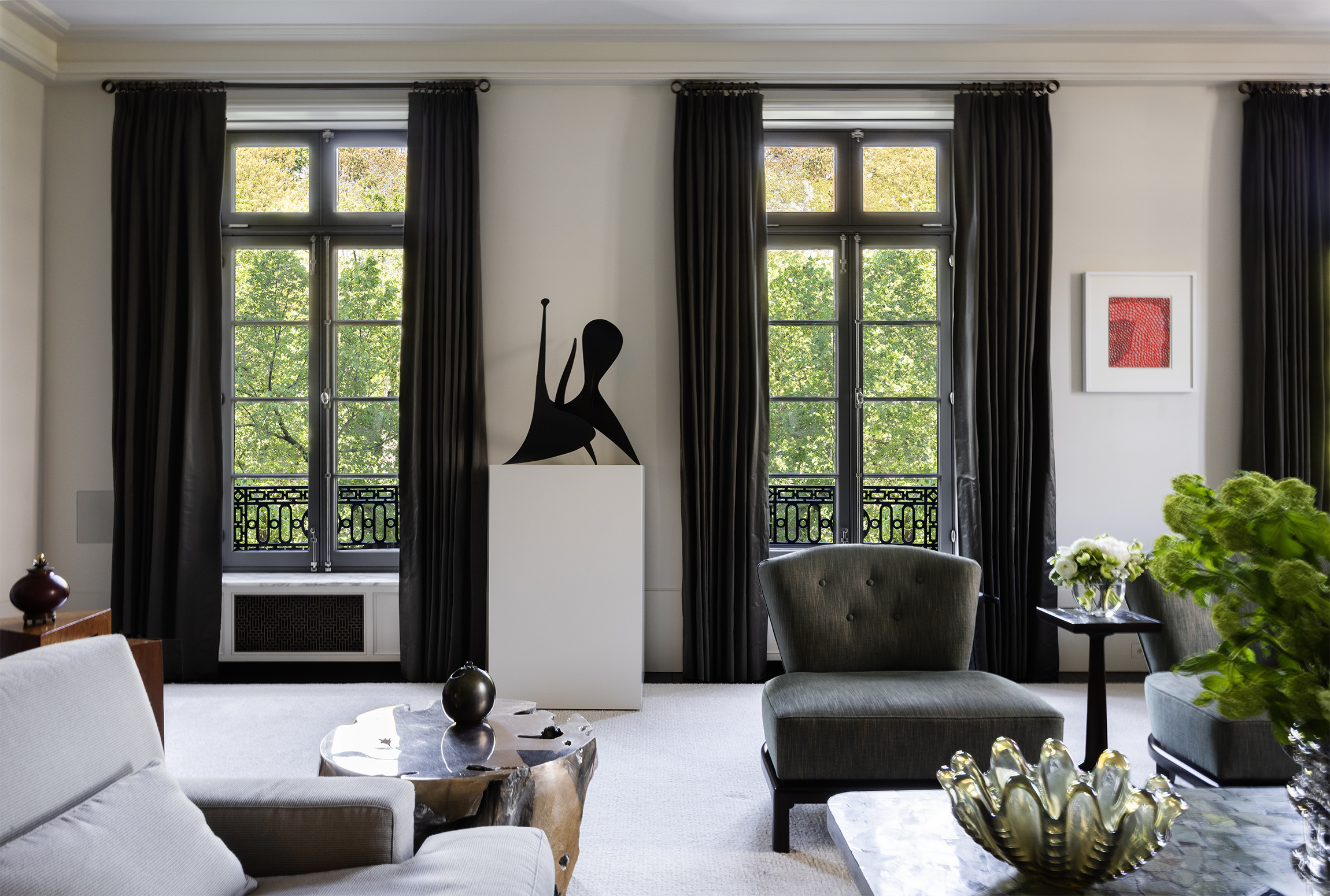 2 East 70th Street, Unit 4A Manhattan, NY 10021 - Photo 3 of 17 a living room with furniture and a large window