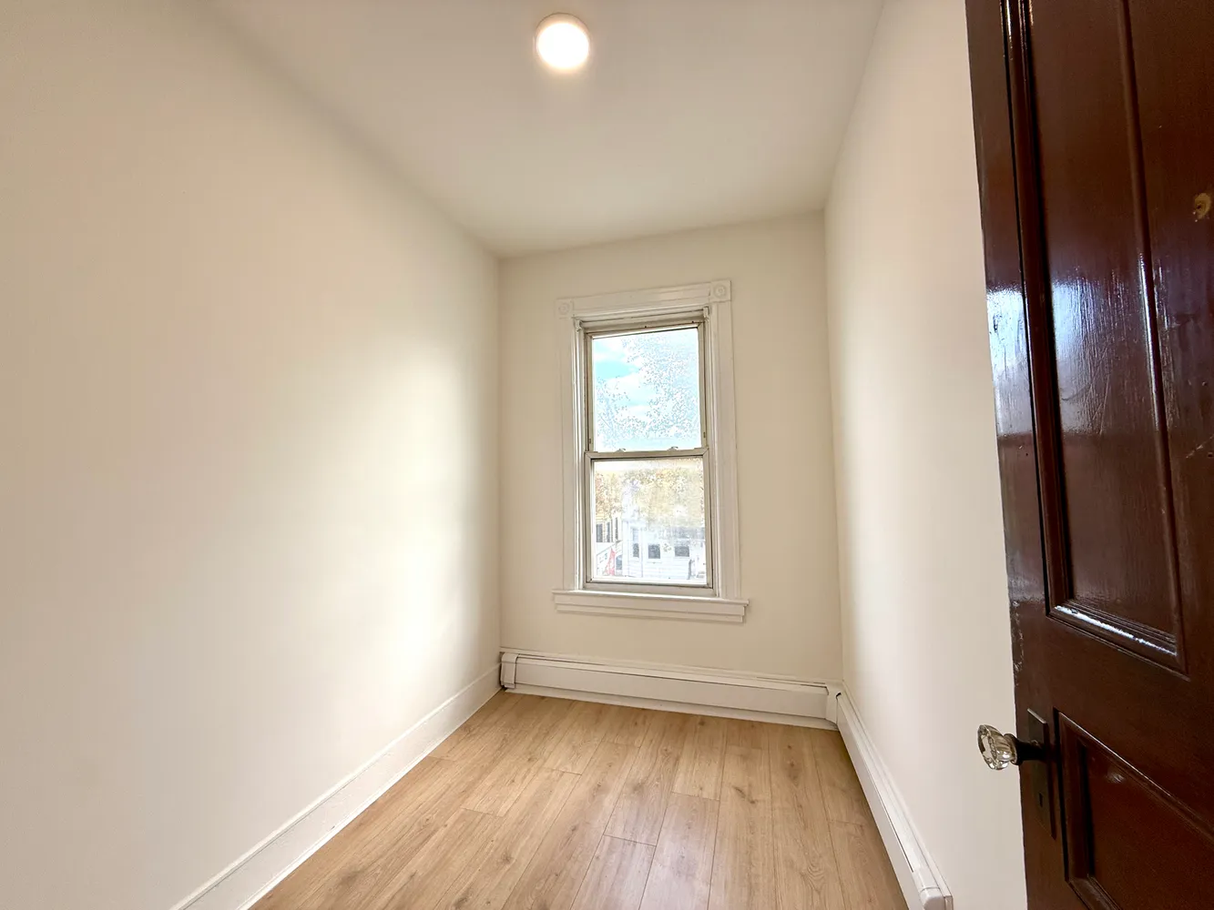 an empty room with windows