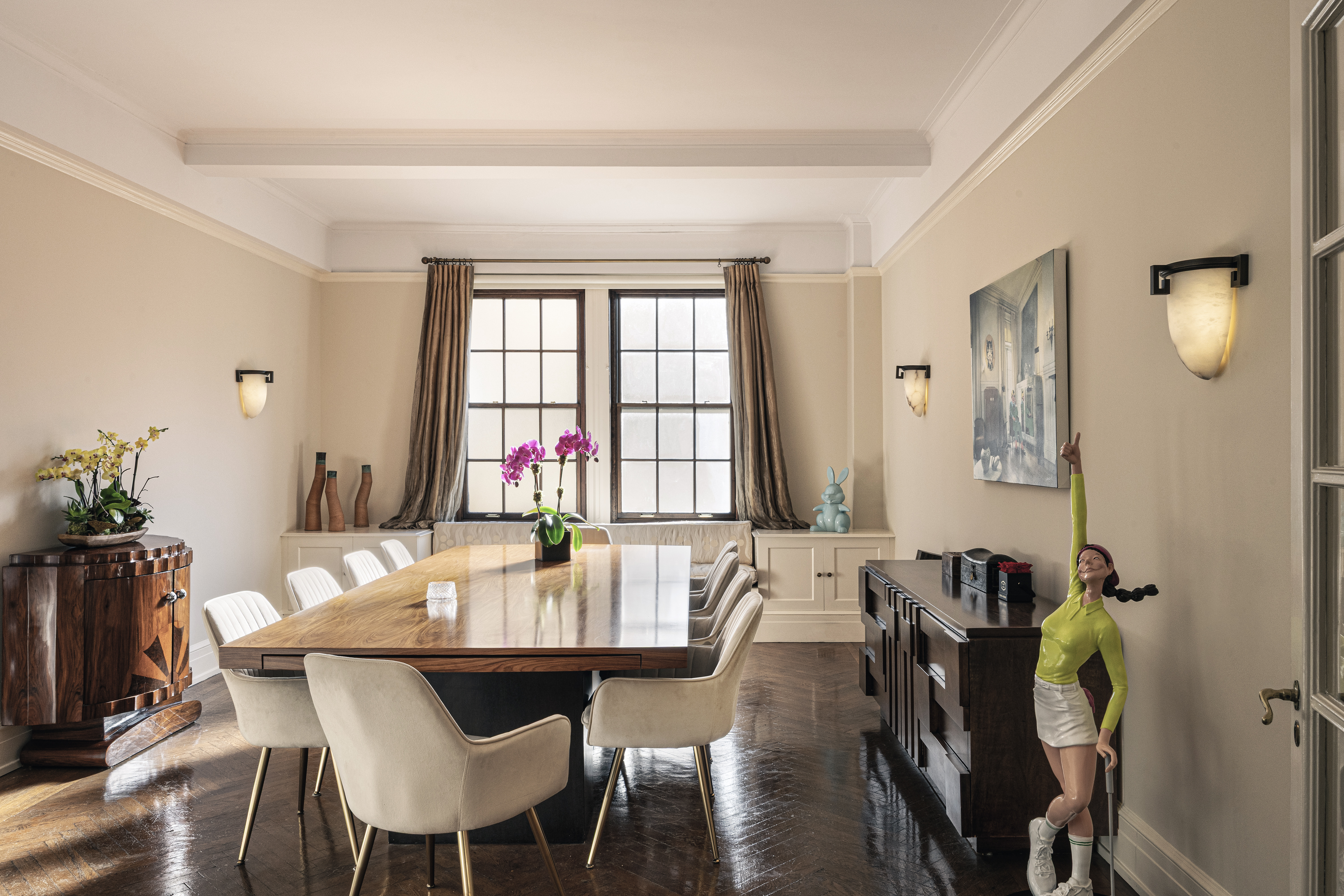 14 East 75th Street, Unit 7E Manhattan, NY 10021 - Photo 3 of 13 a view of a dining room with furniture and wooden floor