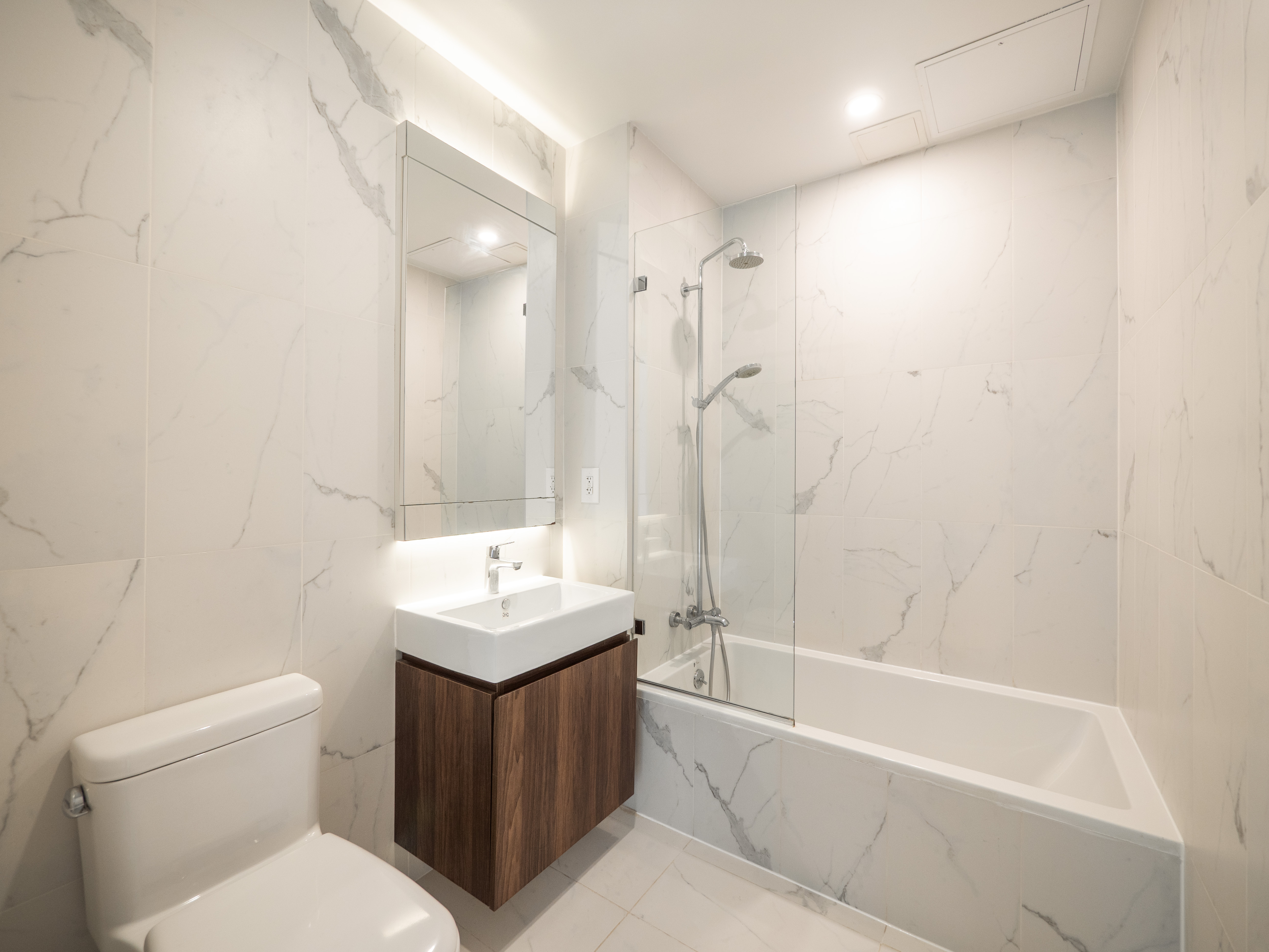 21 Powers Street, Unit 3A Brooklyn, NY 11211 - Photo 8 of 14 a bathroom with a sink toilet and shower