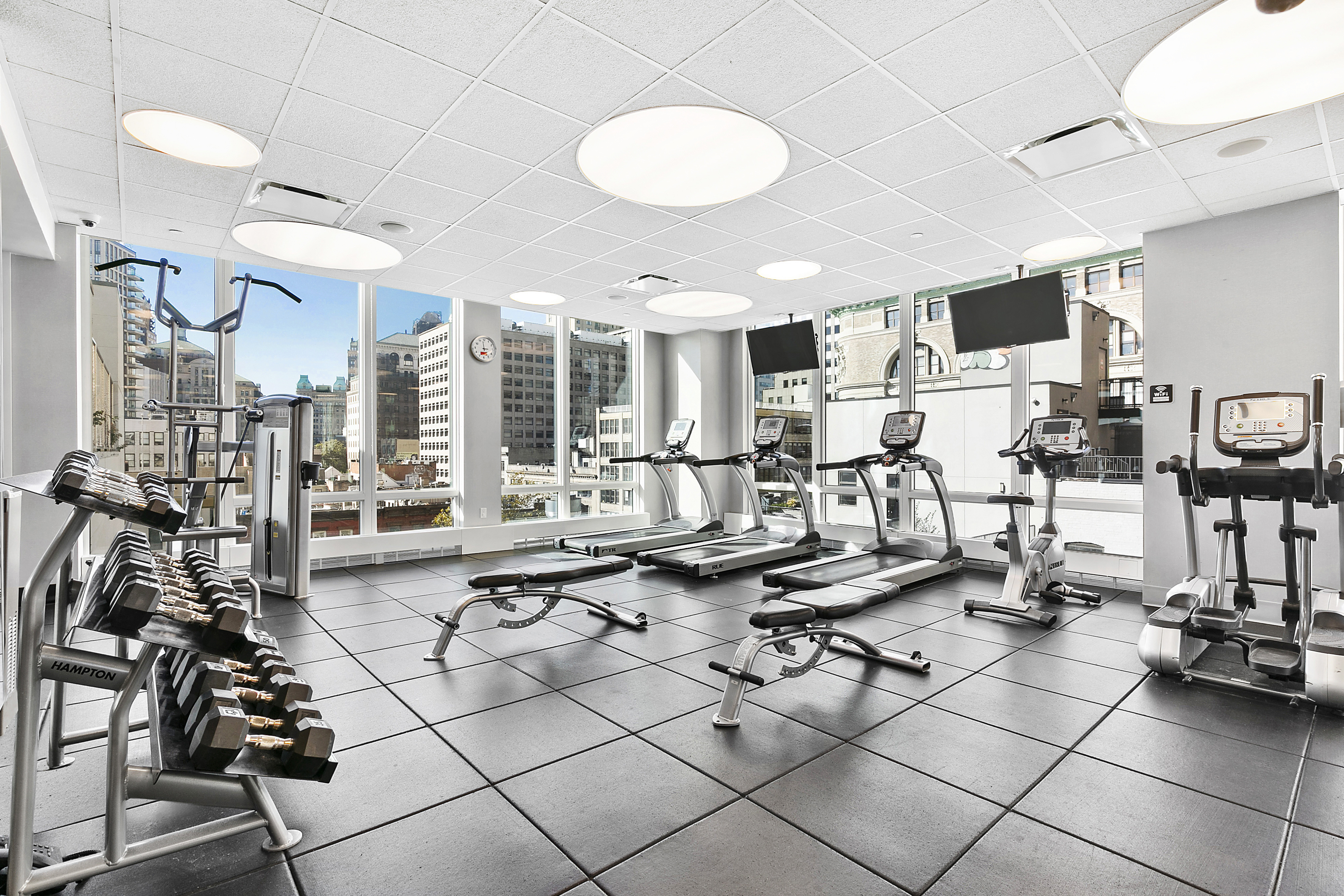 388 Bridge Street, Unit 32G Brooklyn, NY 11201 - Photo 11 of 15 a view of a room with gym equipment