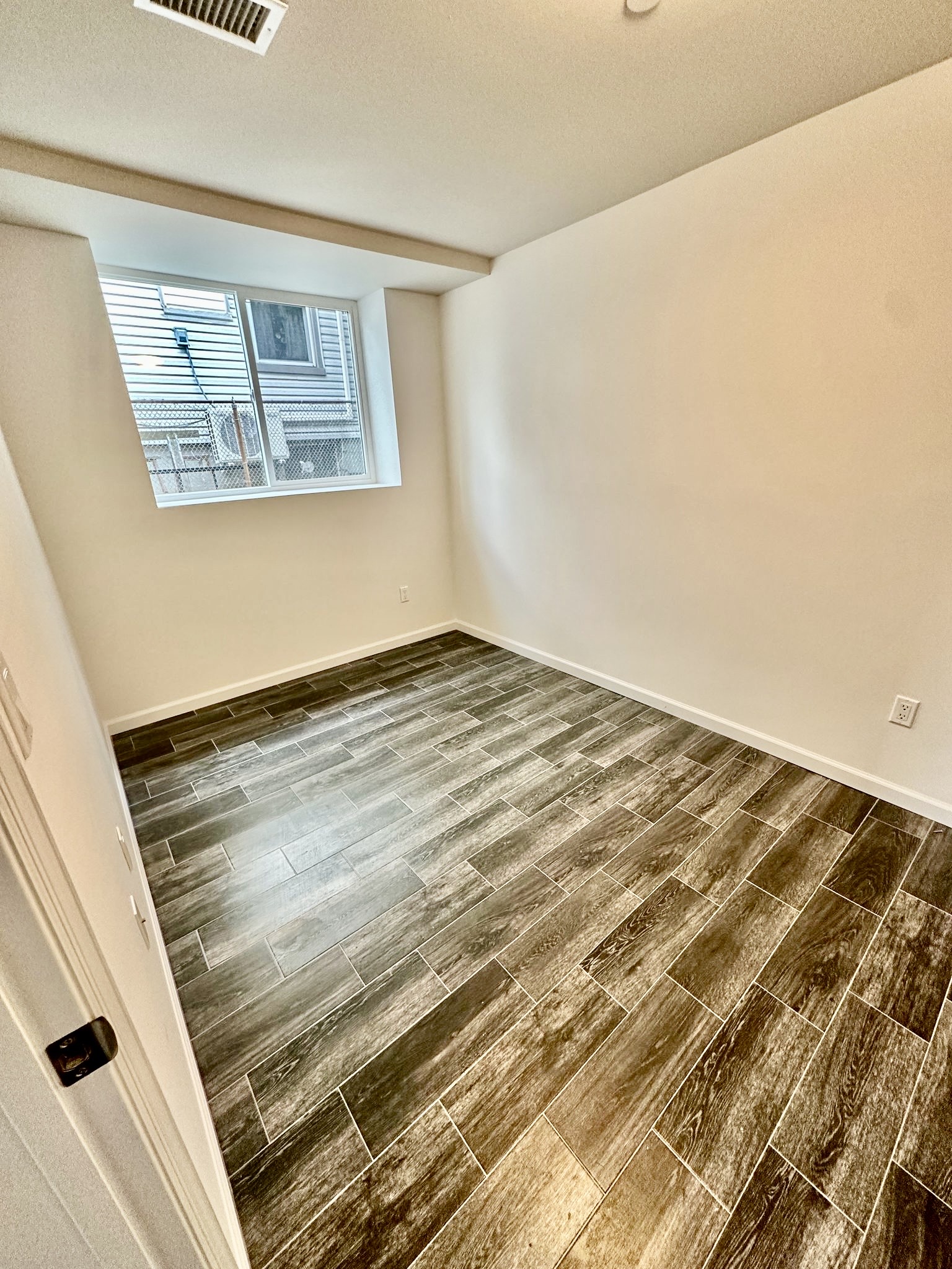 152 Davis Avenue, Unit 1 Staten Island, NY 10310 - Photo 4 of 7 a view of an empty room