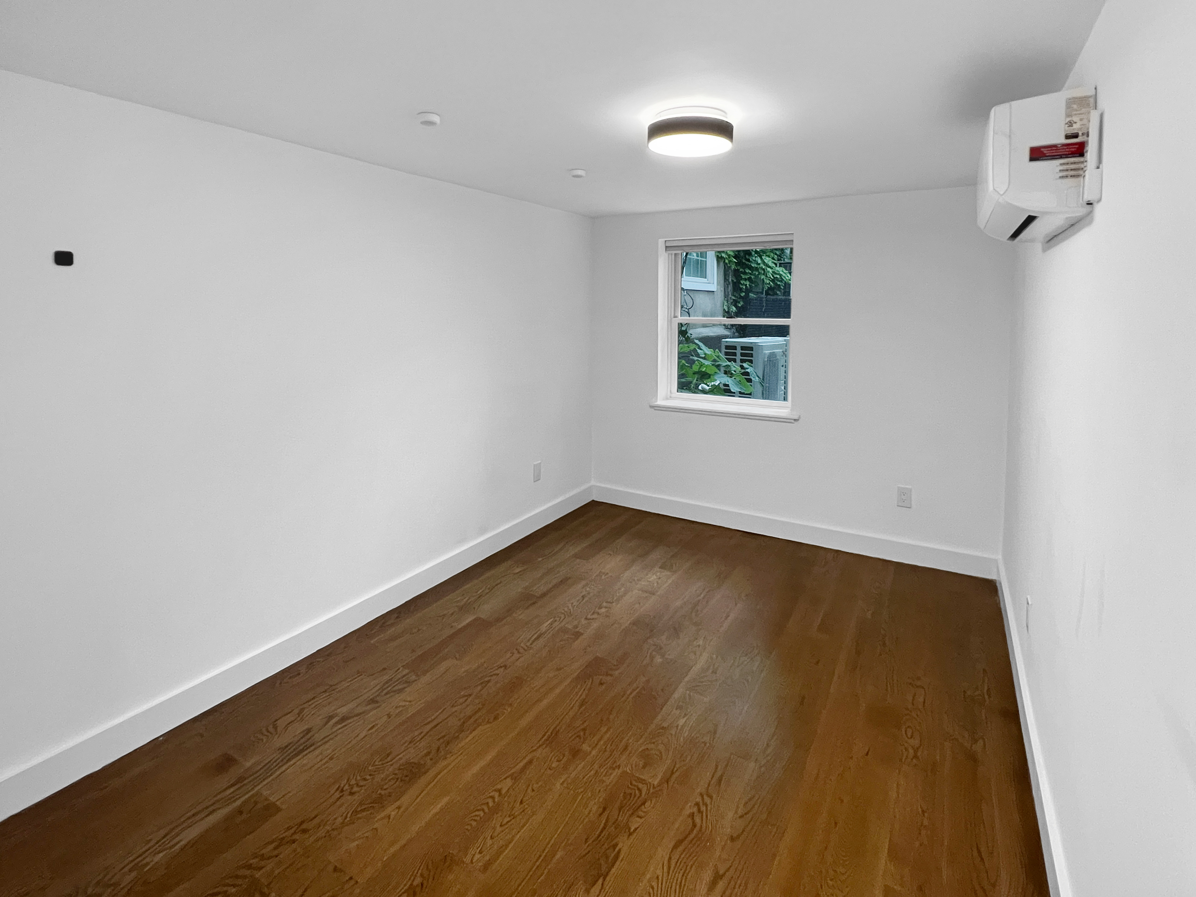 352 Degraw Street, Unit 1 Brooklyn, NY 11231 - Photo 11 of 20 wooden floor in an empty room