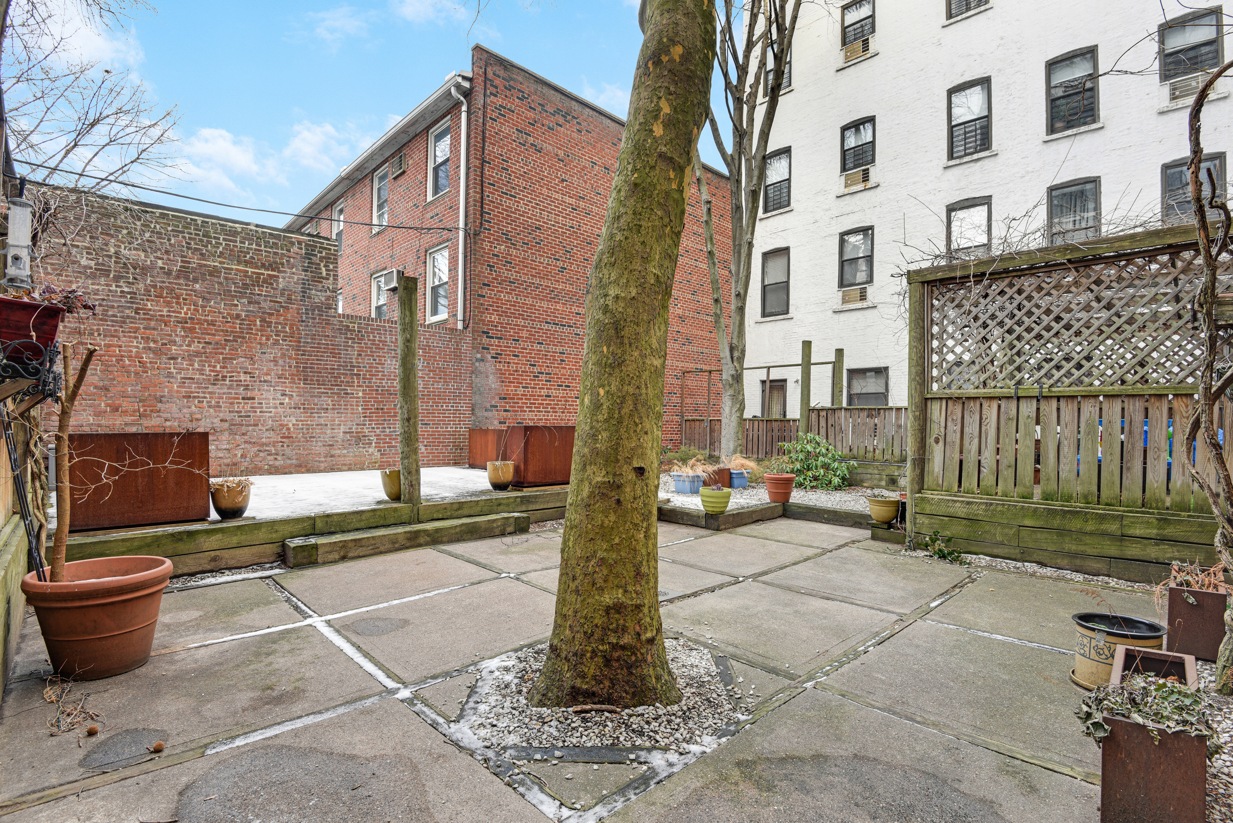 492 Henry Street, Unit 2A Brooklyn, NY 11231 - Photo 12 of 13 a front view of a building with outdoor seating