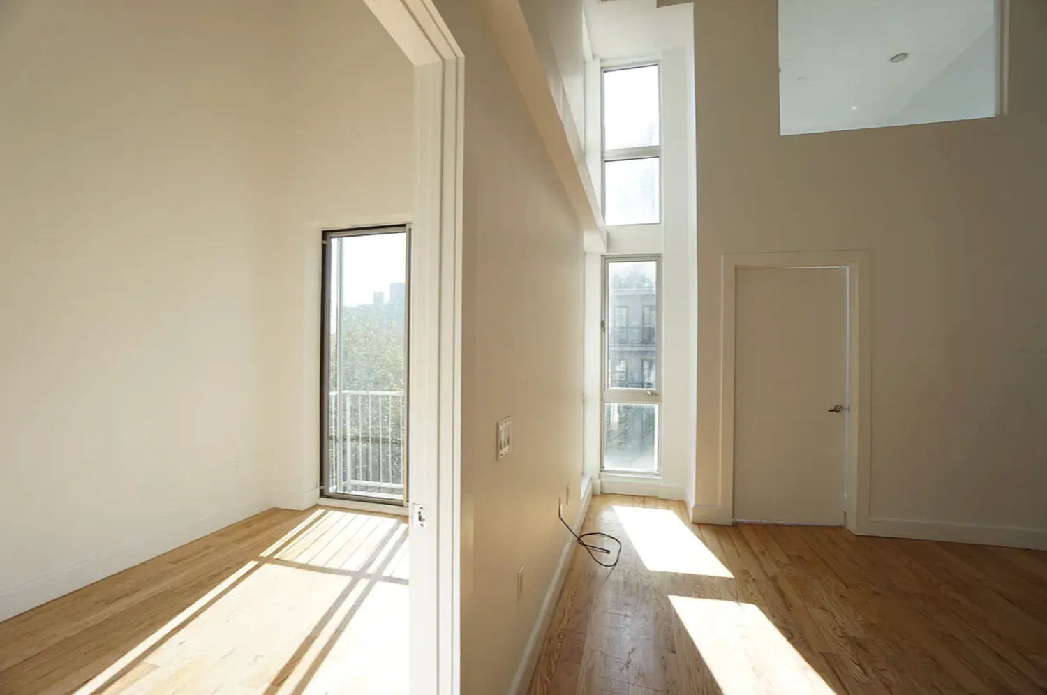 a view of an empty room and window