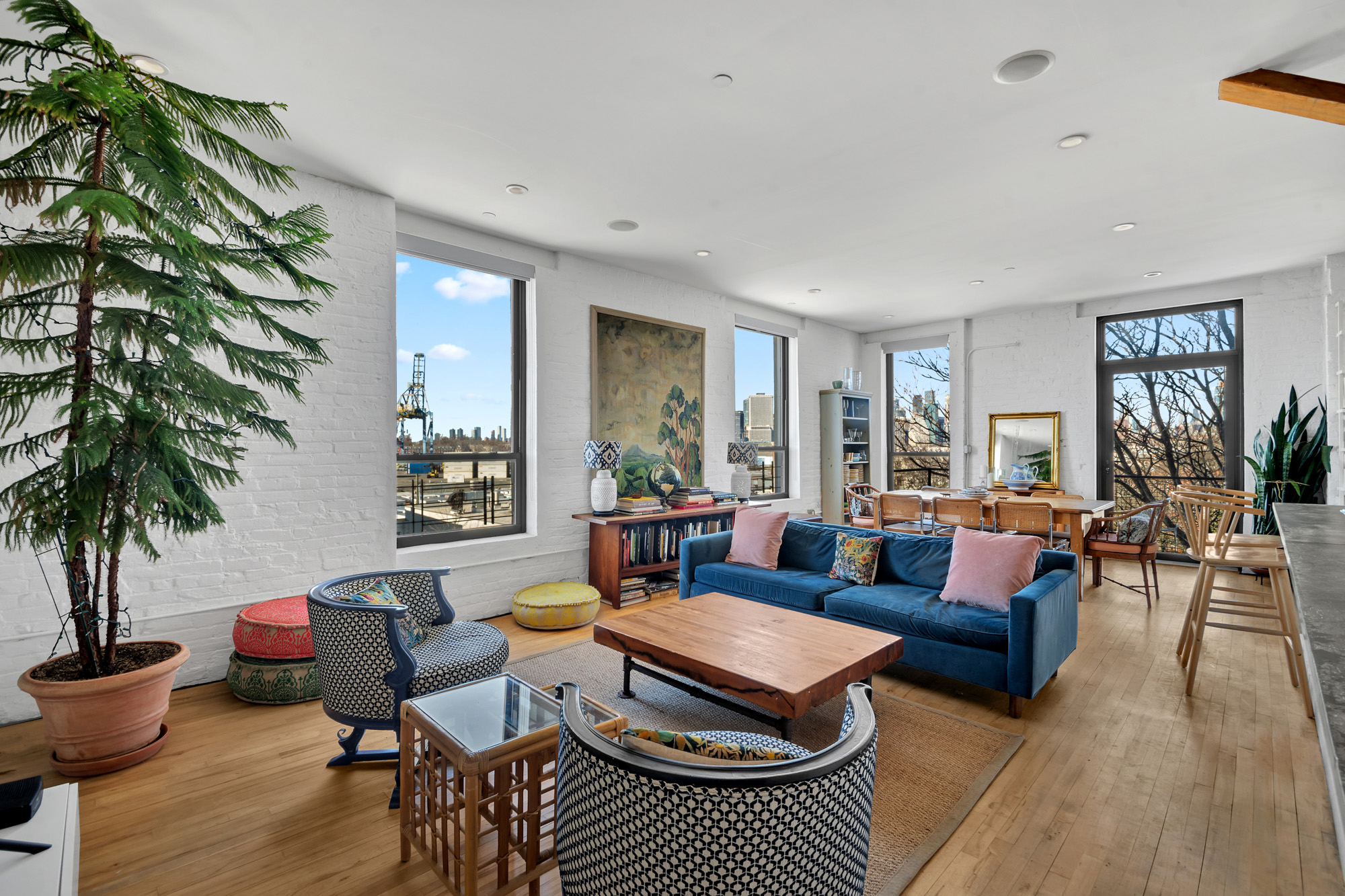 25 Carroll Street, Unit 4C Brooklyn, NY 11231 - Photo 1 of 27 a living room with furniture a rug potted plant and a window