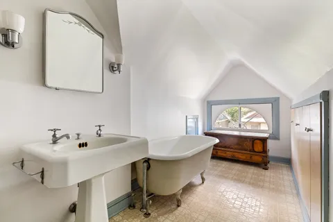 a view of an empty room and window