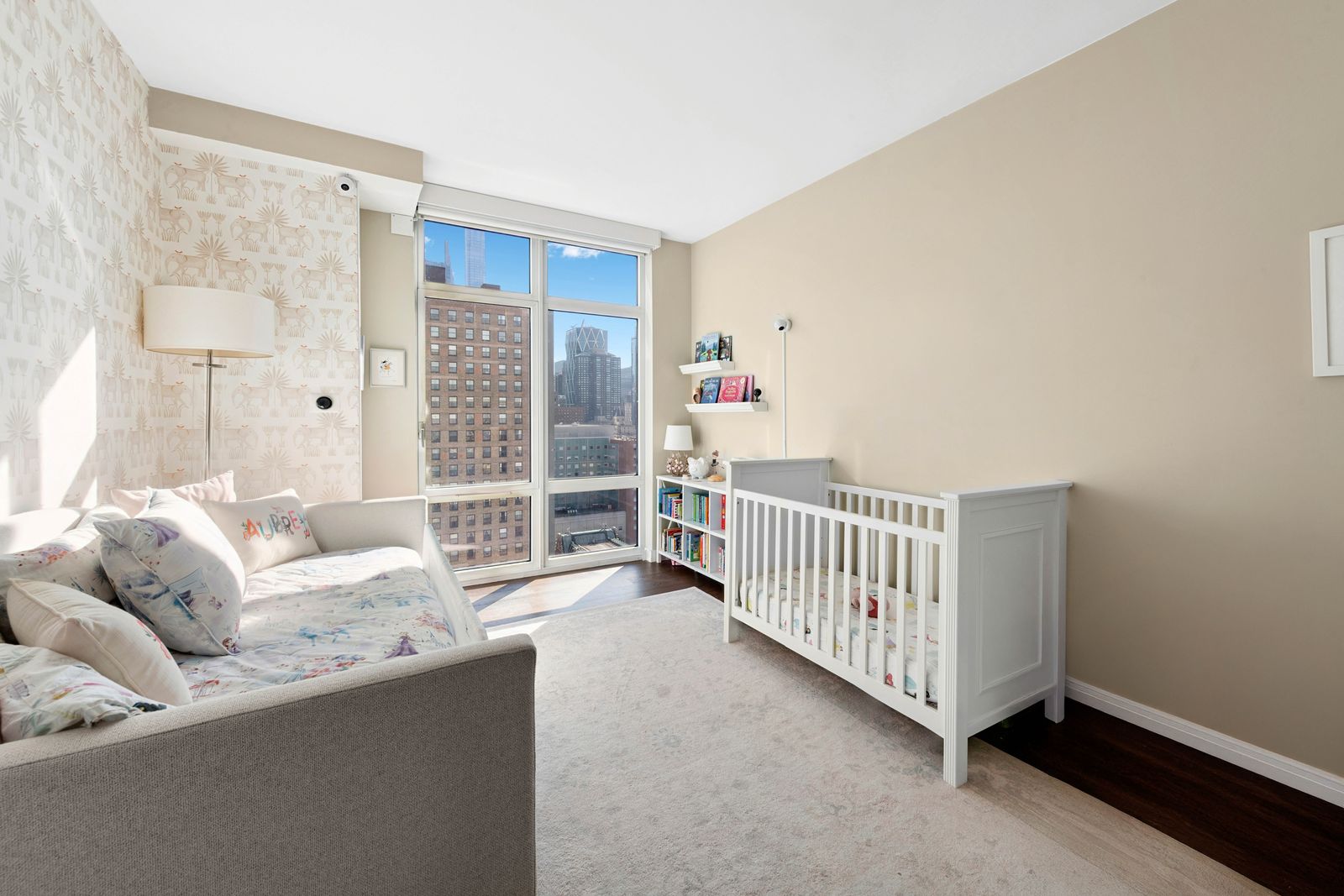 555 West 59th Street, Unit 28D Manhattan, NY 10019 - Photo 8 of 19 a living room with furniture and a large window