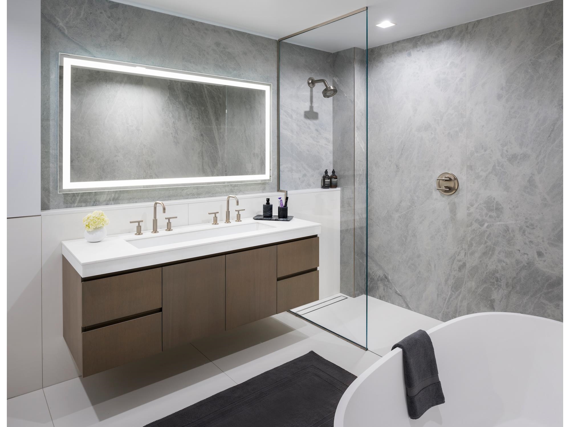 320 Adolphus Avenue, Unit 907 Cliffside Park, NJ 07010 - Photo 8 of 29 a bathroom with a sink double vanity and a mirror