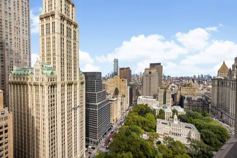 a view of a city with tall buildings