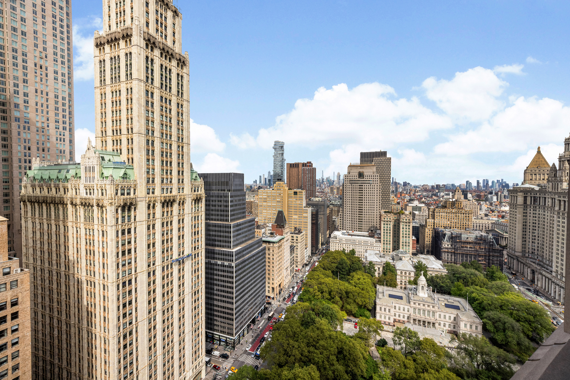 25 Park Row, Unit 29A Manhattan, NY 10038 - Photo 20 of 23 a view of a city with tall buildings