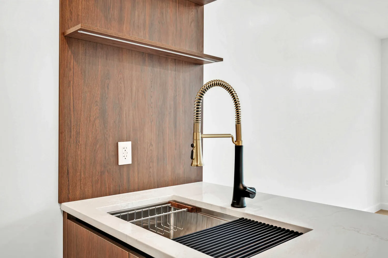 a kitchen with a sink and a refrigerator
