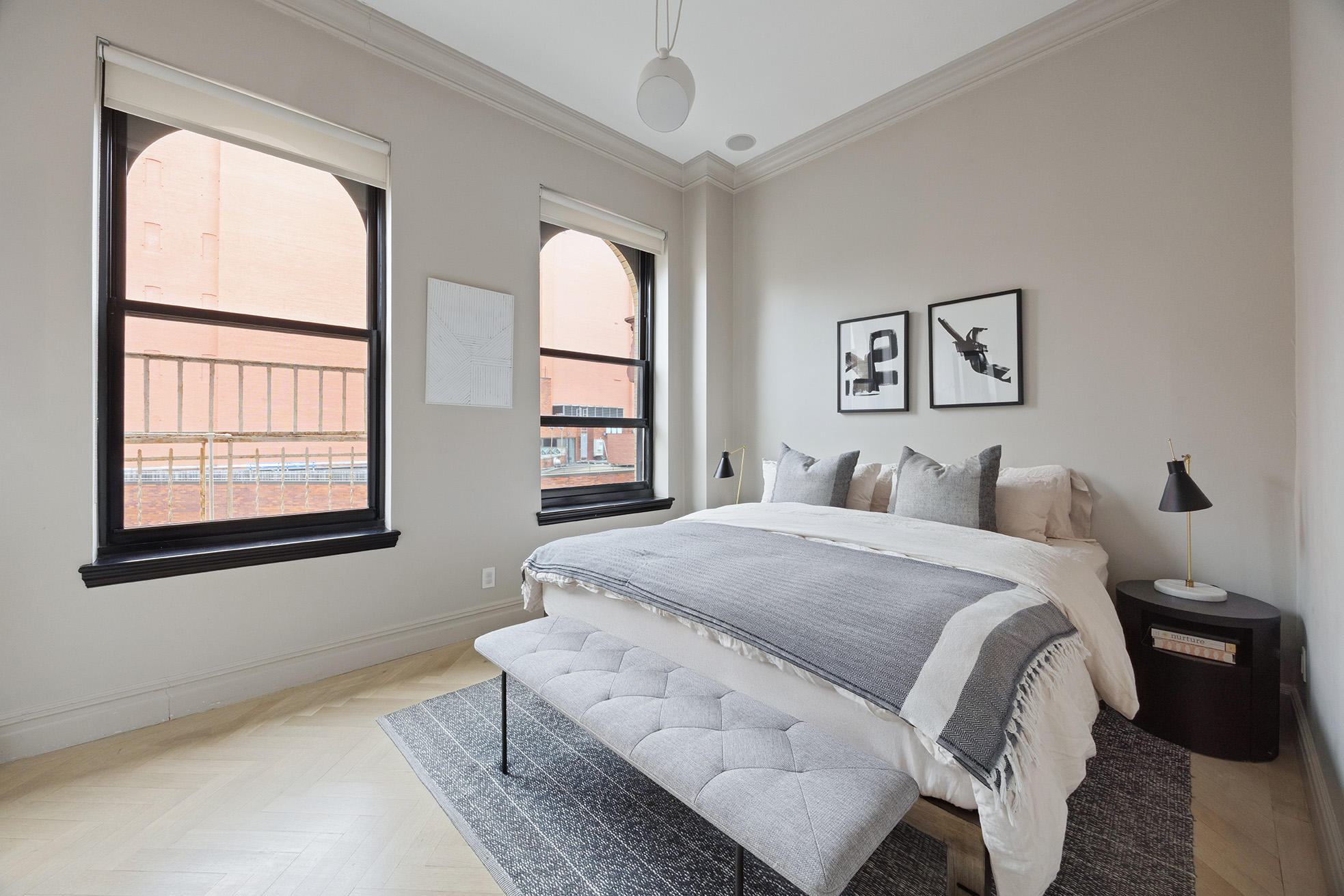 250 Mercer Street, Unit A504 Manhattan, NY 10012 - Photo 5 of 13 a bed room with a bed and a window