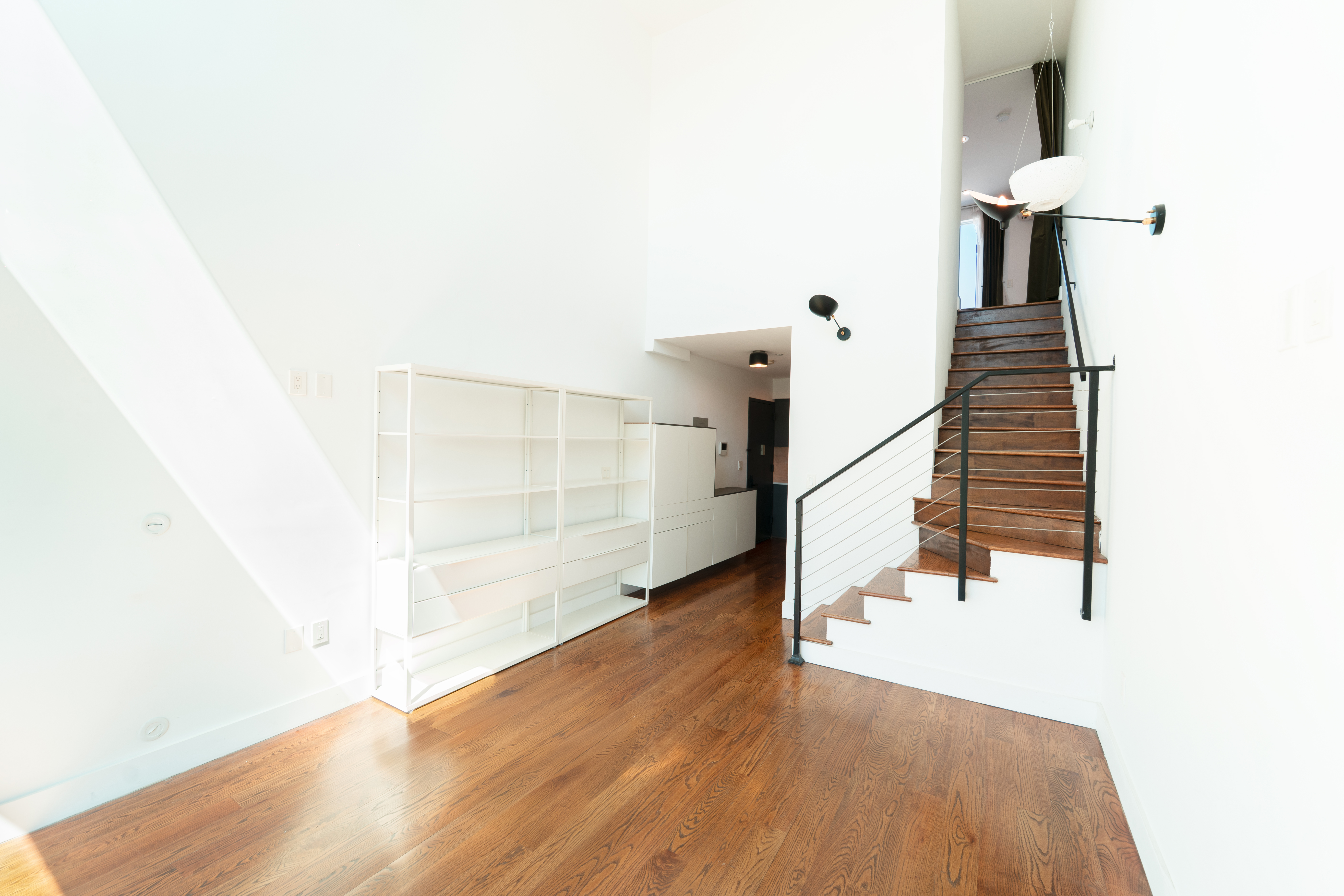 299 Van Buren Street, Unit 4C Brooklyn, NY 11221 - Photo 7 of 16 a view of entryway and hall with wooden floor