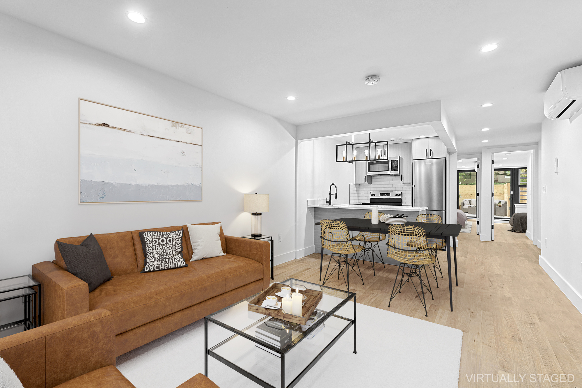 162 Cornelia Street, Unit 1 Brooklyn, NY 11221 - Photo 2 of 11 a living room with furniture and a table