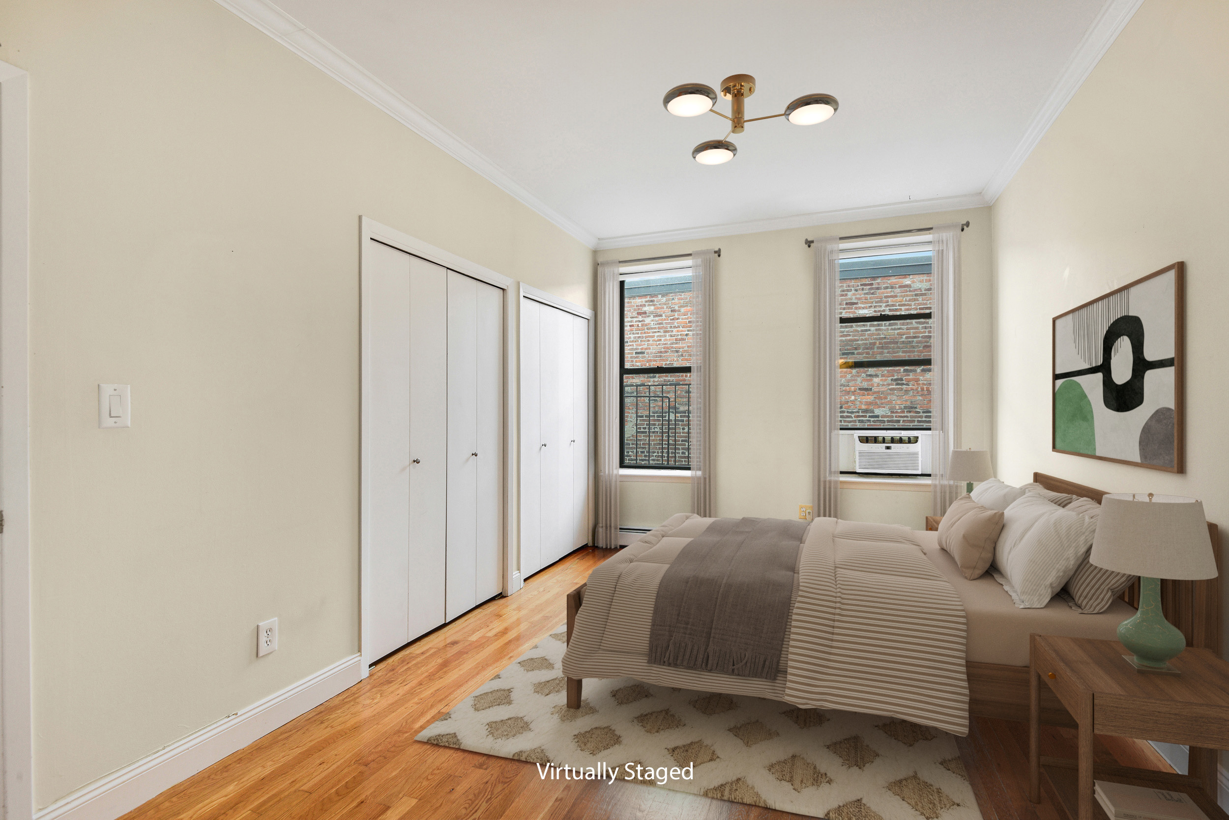 120 2nd Avenue, Unit 5A Manhattan, NY 10003 - Photo 4 of 10 a bedroom with a bed and a window