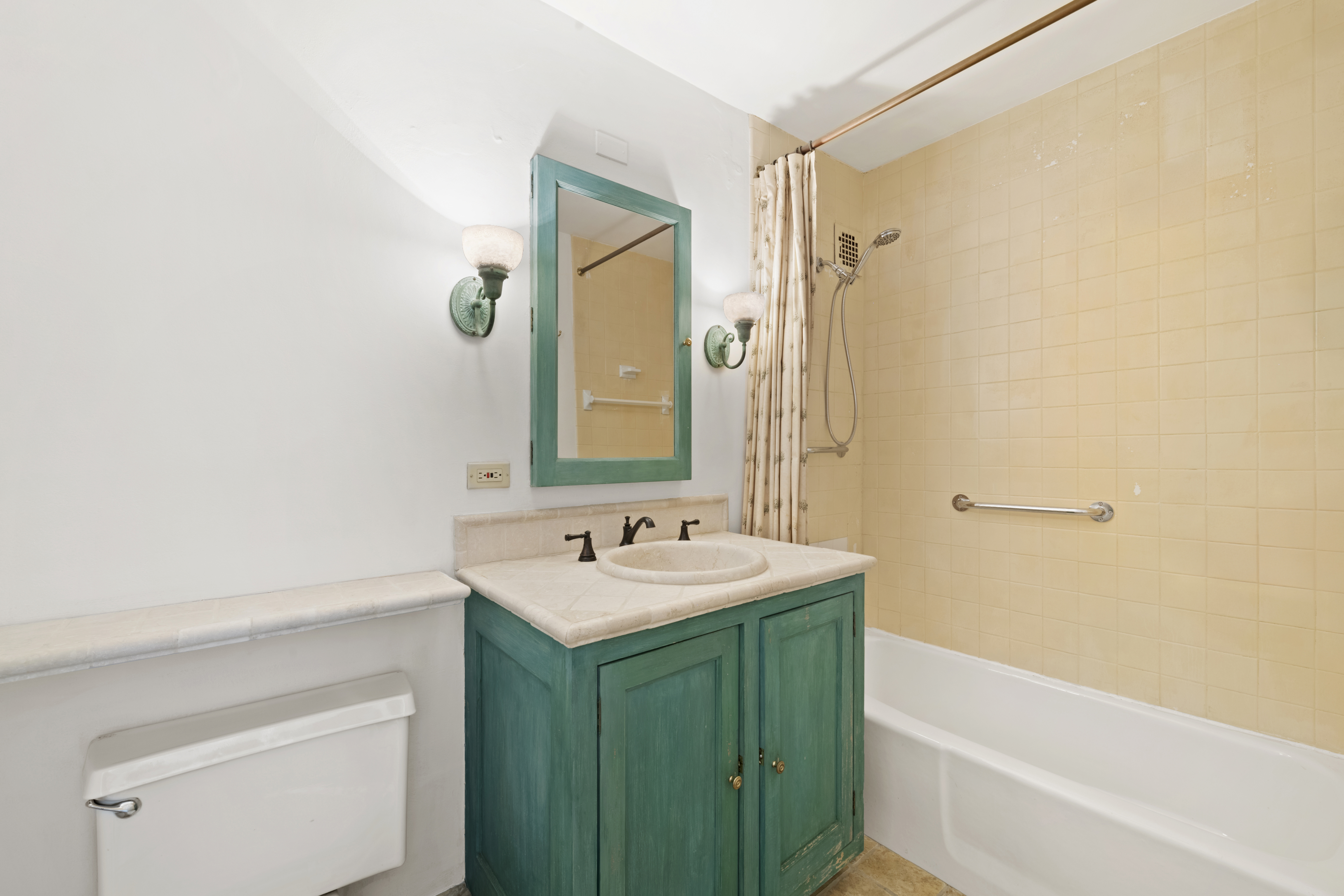 140 Thompson, Unit 4A Manhattan, NY 10012 - Photo 10 of 13 a bathroom with a sink and a mirror