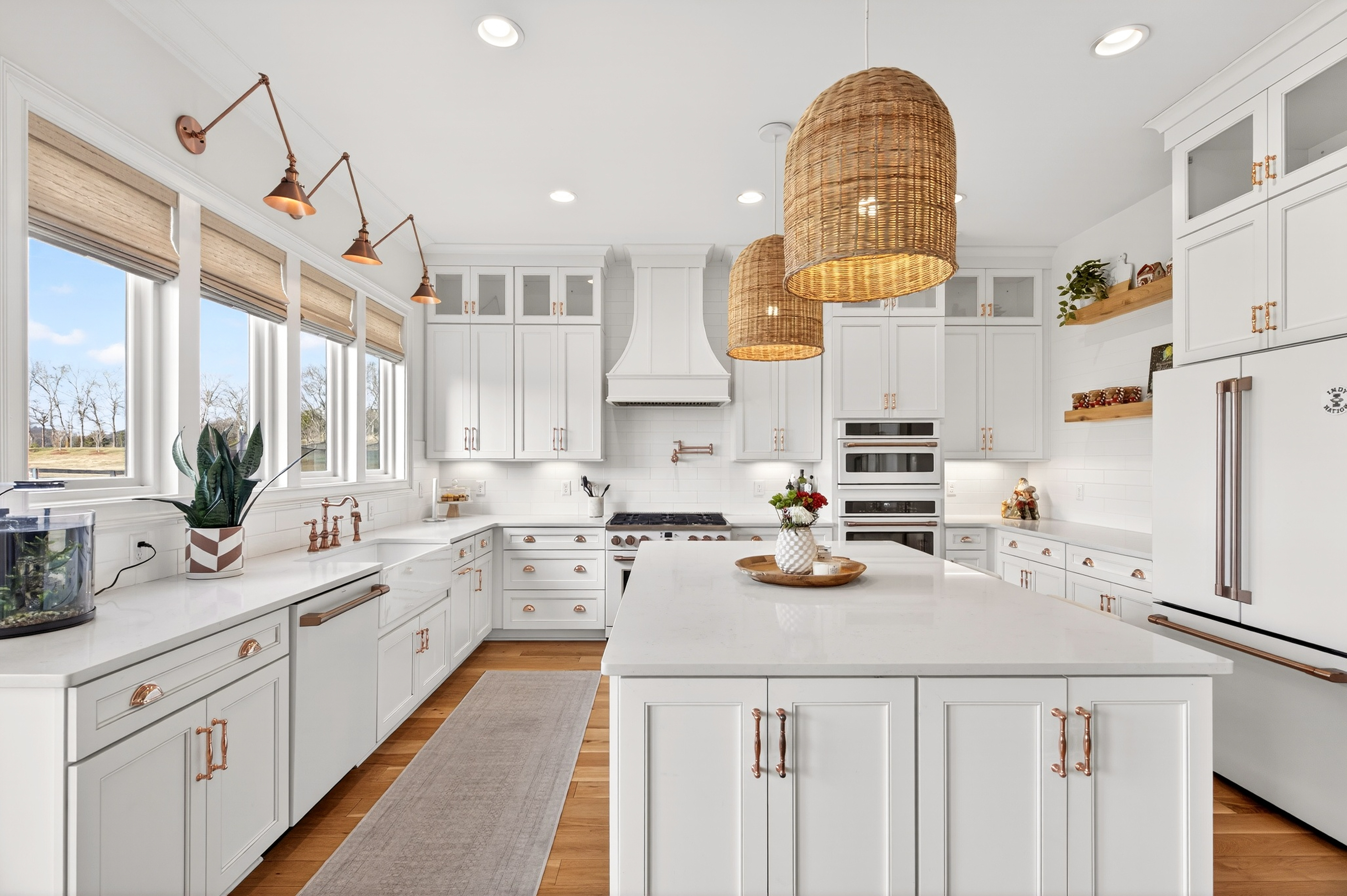 1703 Swansons Rdg Drive Franklin, TN 37064 - Photo 25 of 67 a kitchen with a sink a stove cabinets and counter space