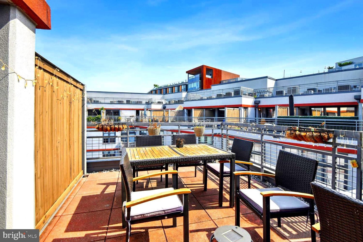 2120 Vermont Avenue Northwest, Unit 620 Washington, DC 20001 - Photo 26 of 61 a view of a chairs and table in a balcony