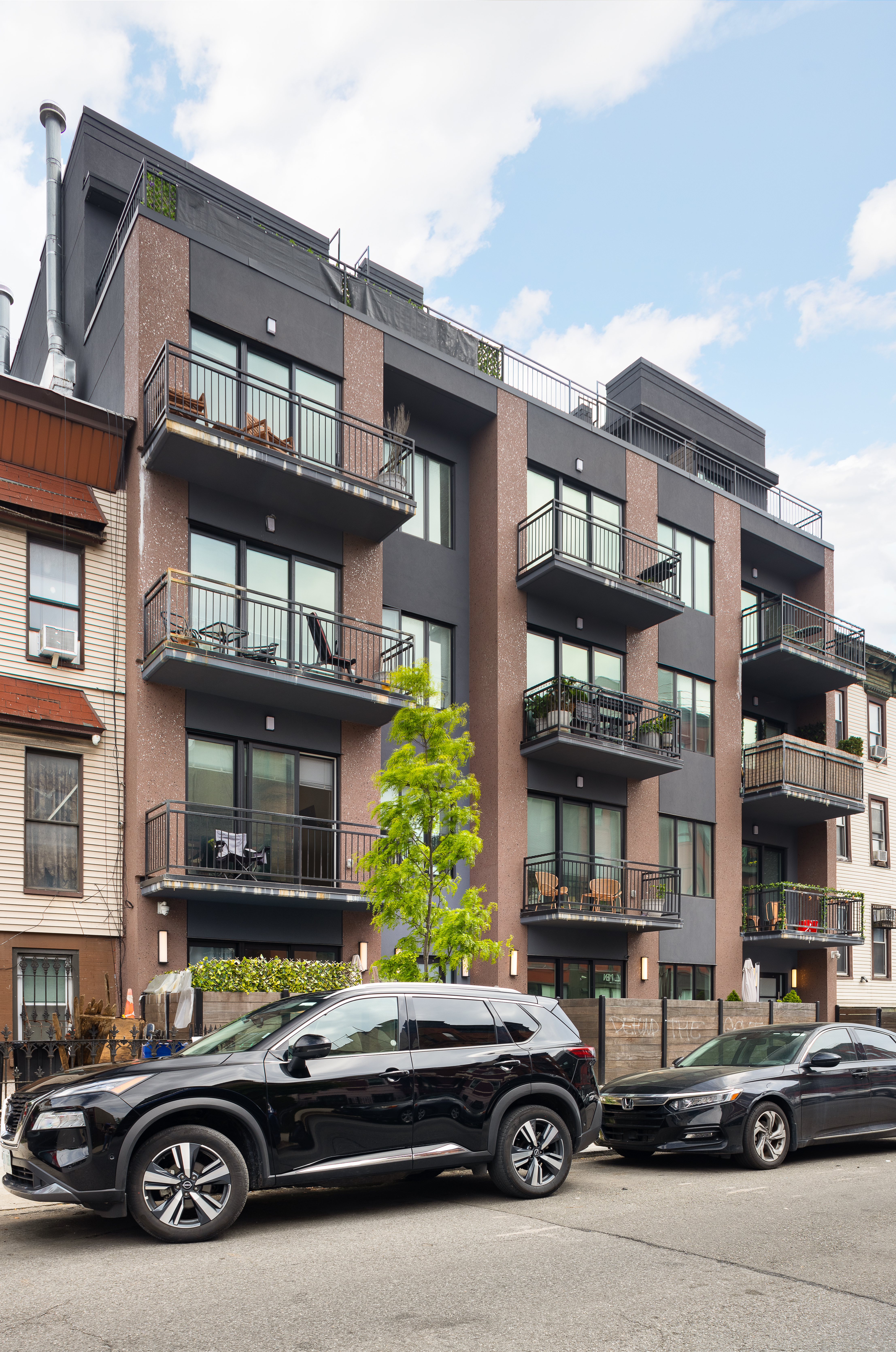 1122 Lafayette Avenue, Unit 4C Brooklyn, NY 11221 - Photo 12 of 14 a car parked in front of a building