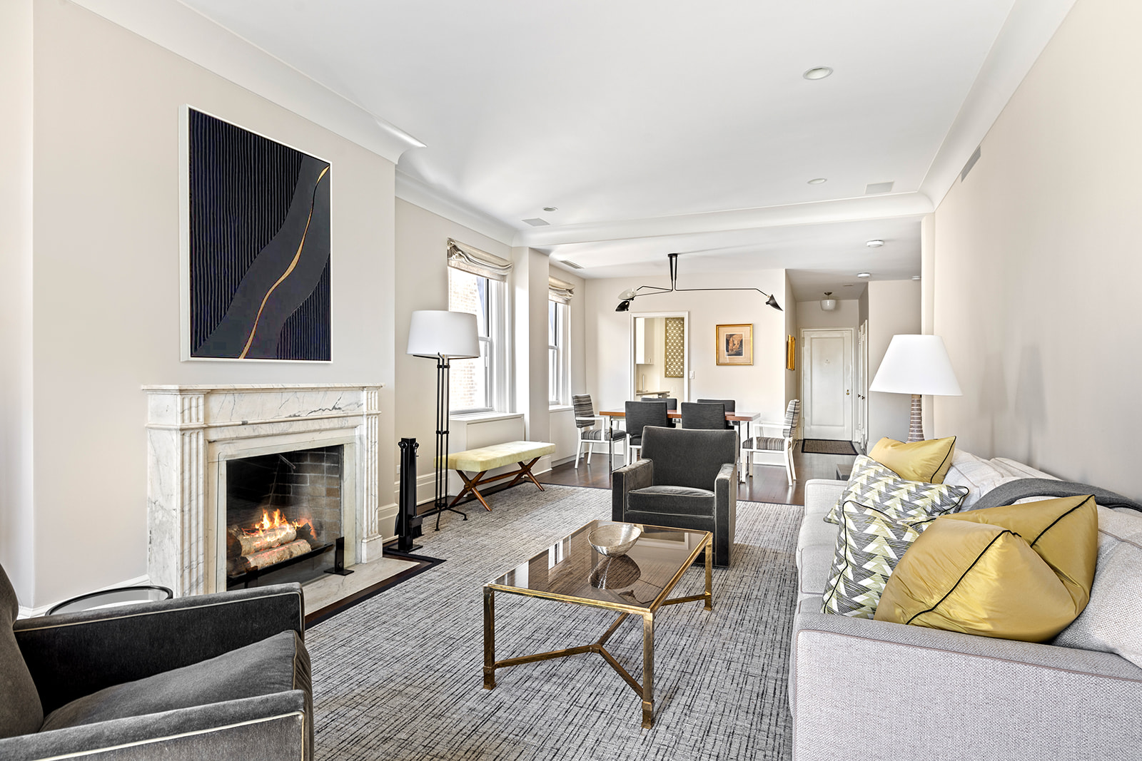 969 Park Avenue, Unit PHB Manhattan, NY 10028 - Photo 2 of 9 a living room with furniture and a fireplace