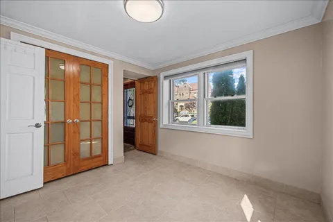 a view of an empty room with a window