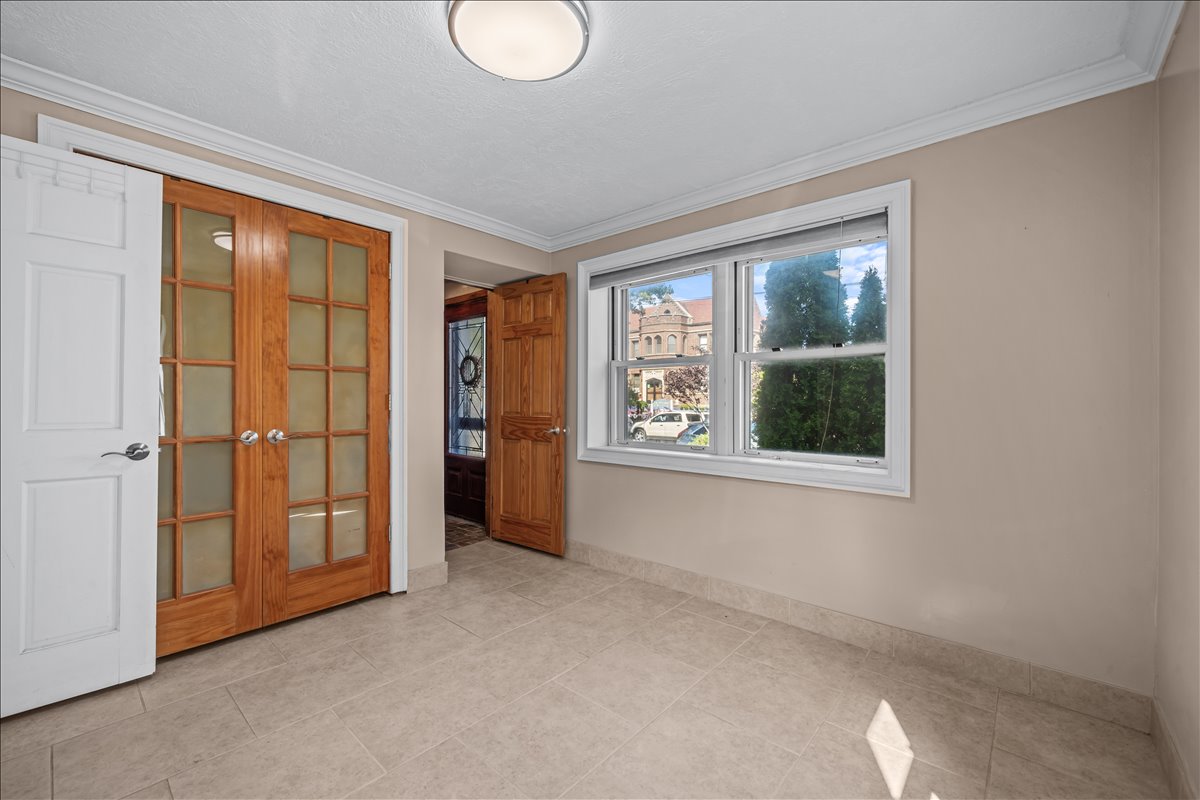 100-14 159th Avenue Queens, NY 11414 - Photo 6 of 26 a view of an empty room with a window