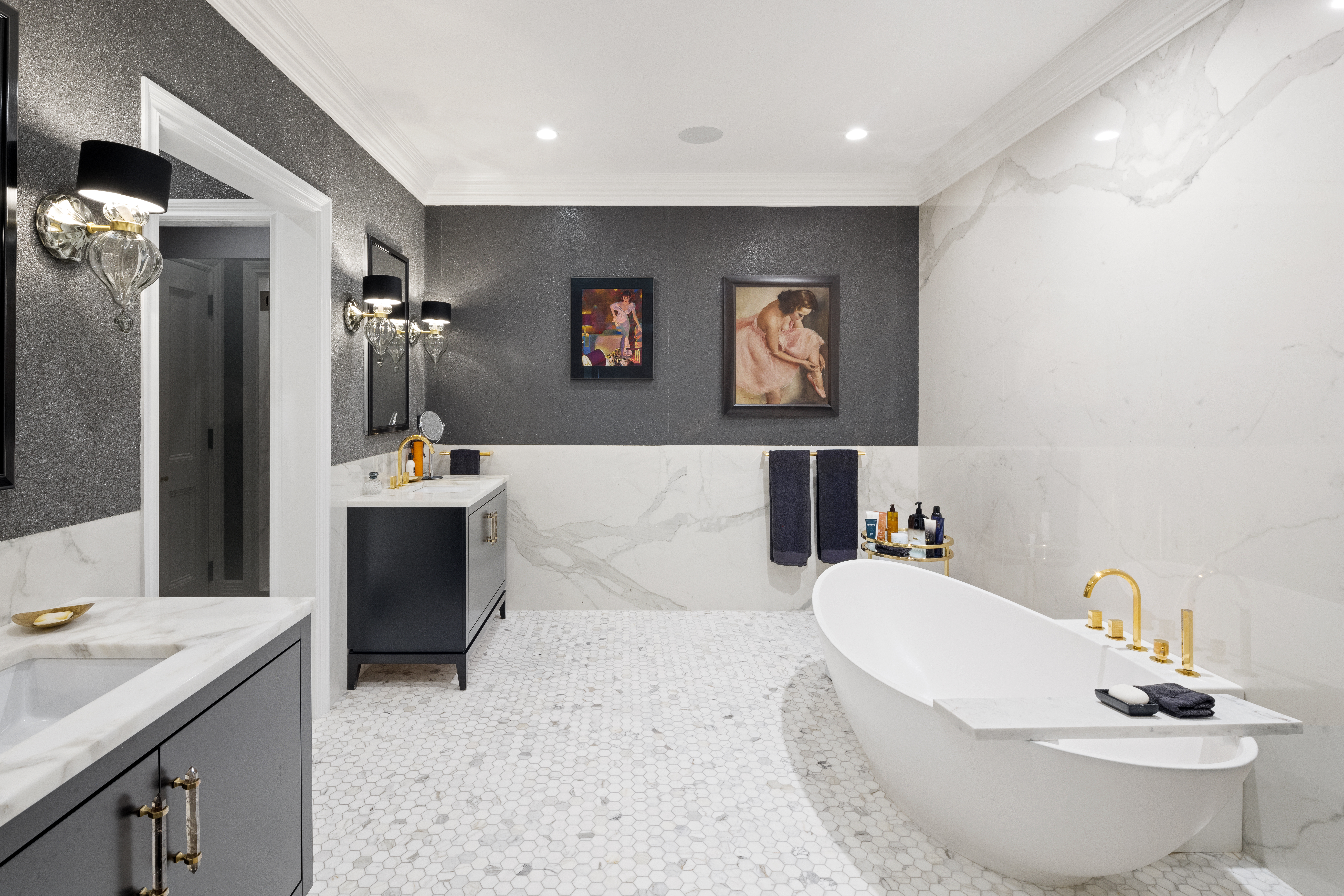 30 Crosby Street, Unit 5B Manhattan, NY 10013 - Photo 12 of 19 a bathroom with a tub sink a mirror and vanity