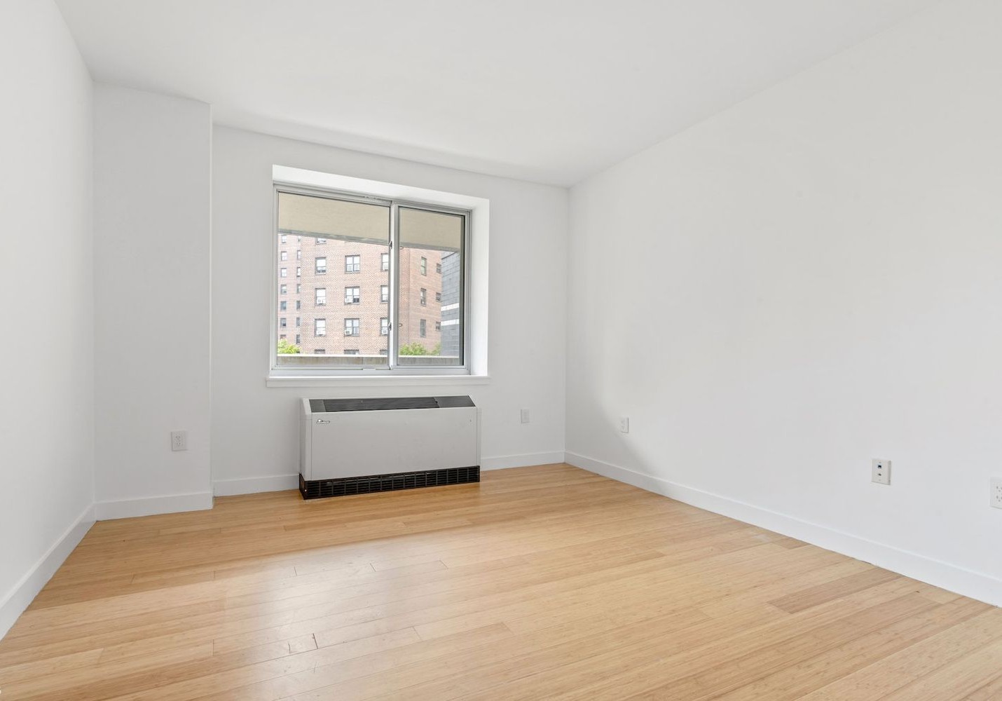 40 West 116th Street, Unit B503 Manhattan, NY 10026 - Photo 10 of 36 an empty room with a window