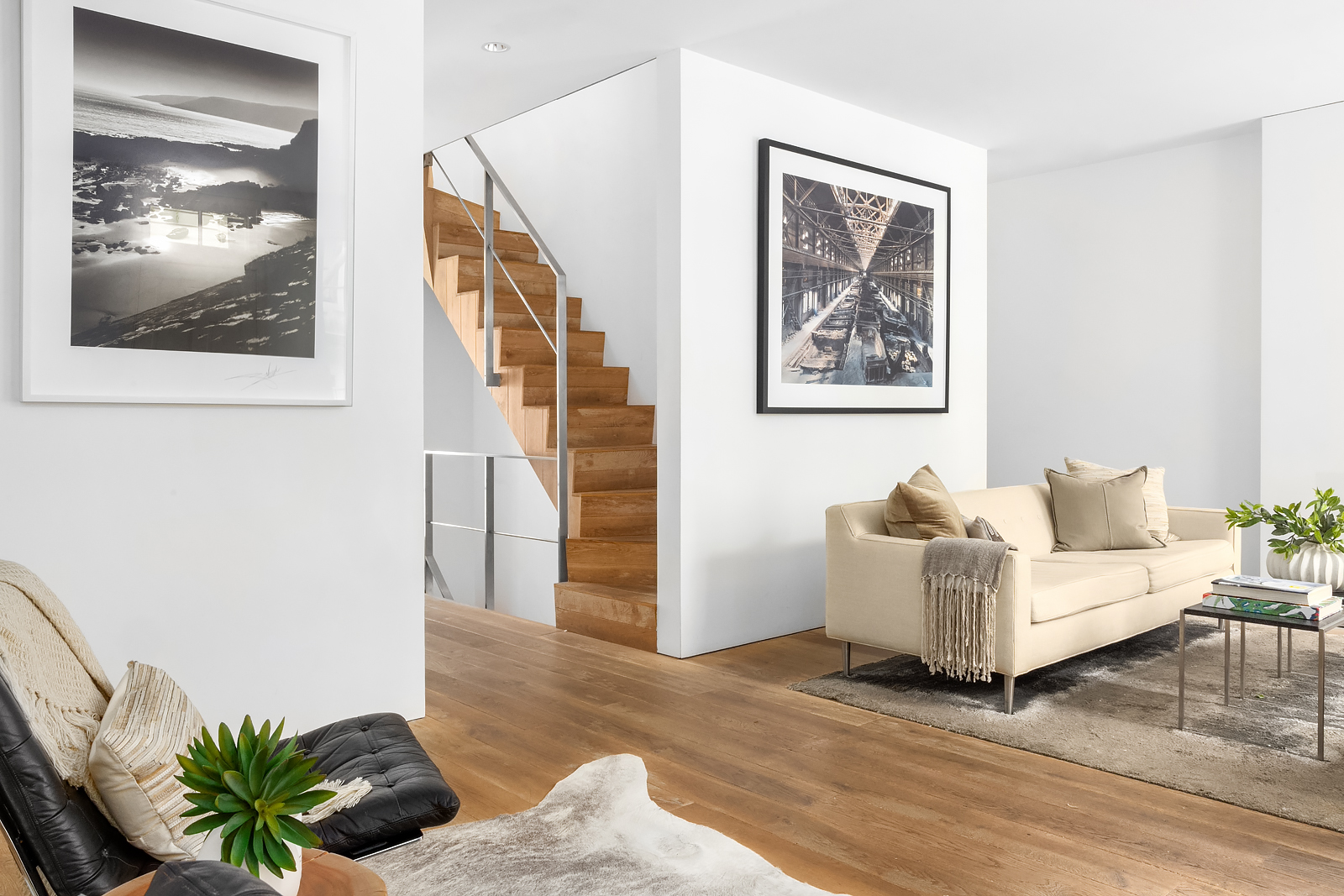 130 Charles Street Manhattan, NY 10014 - Photo 3 of 14 a living room with furniture and a painting on the wall