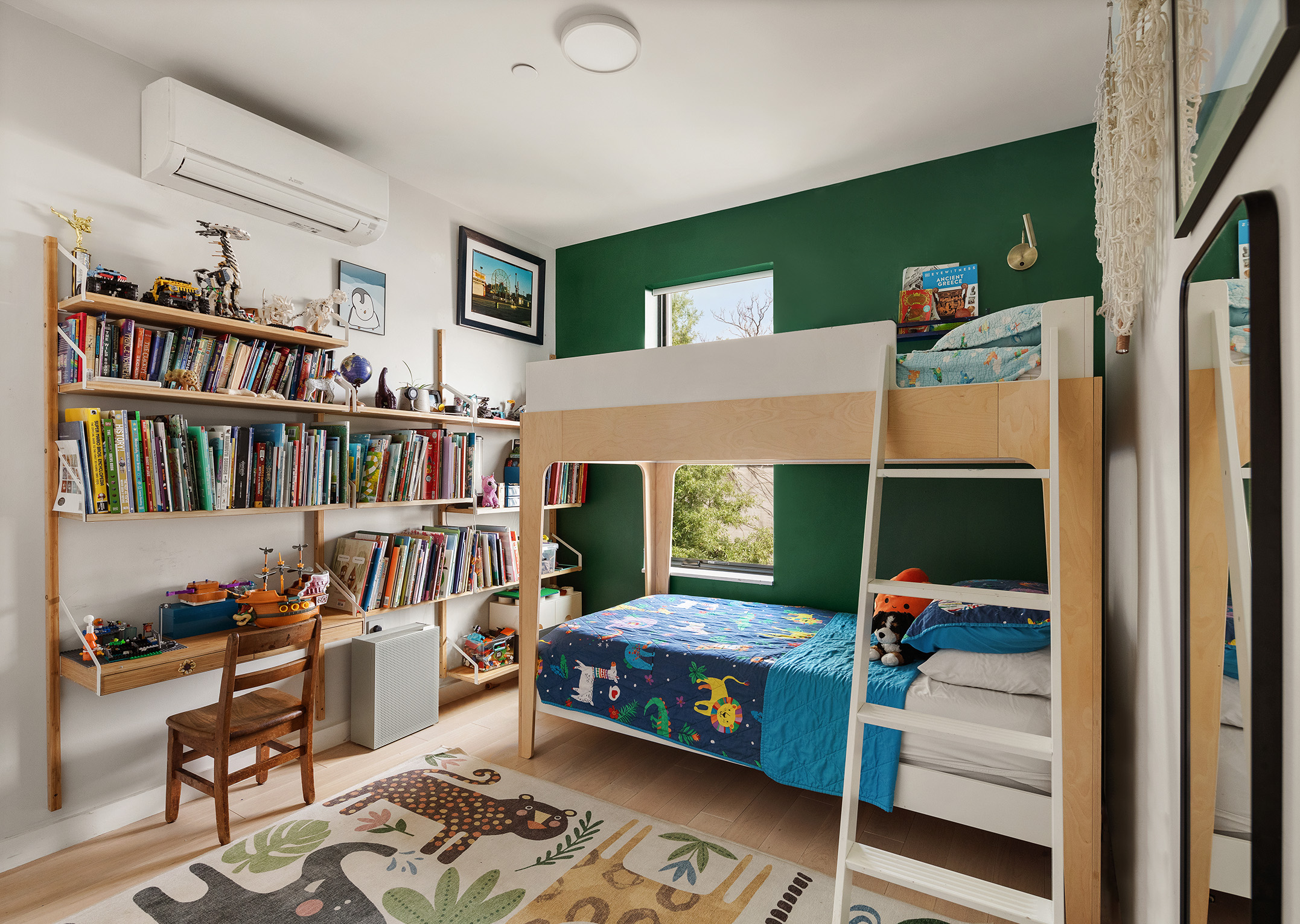 351 Union Street, Unit B Brooklyn, NY 11231 - Photo 10 of 14 a bedroom with furniture and a book shelf