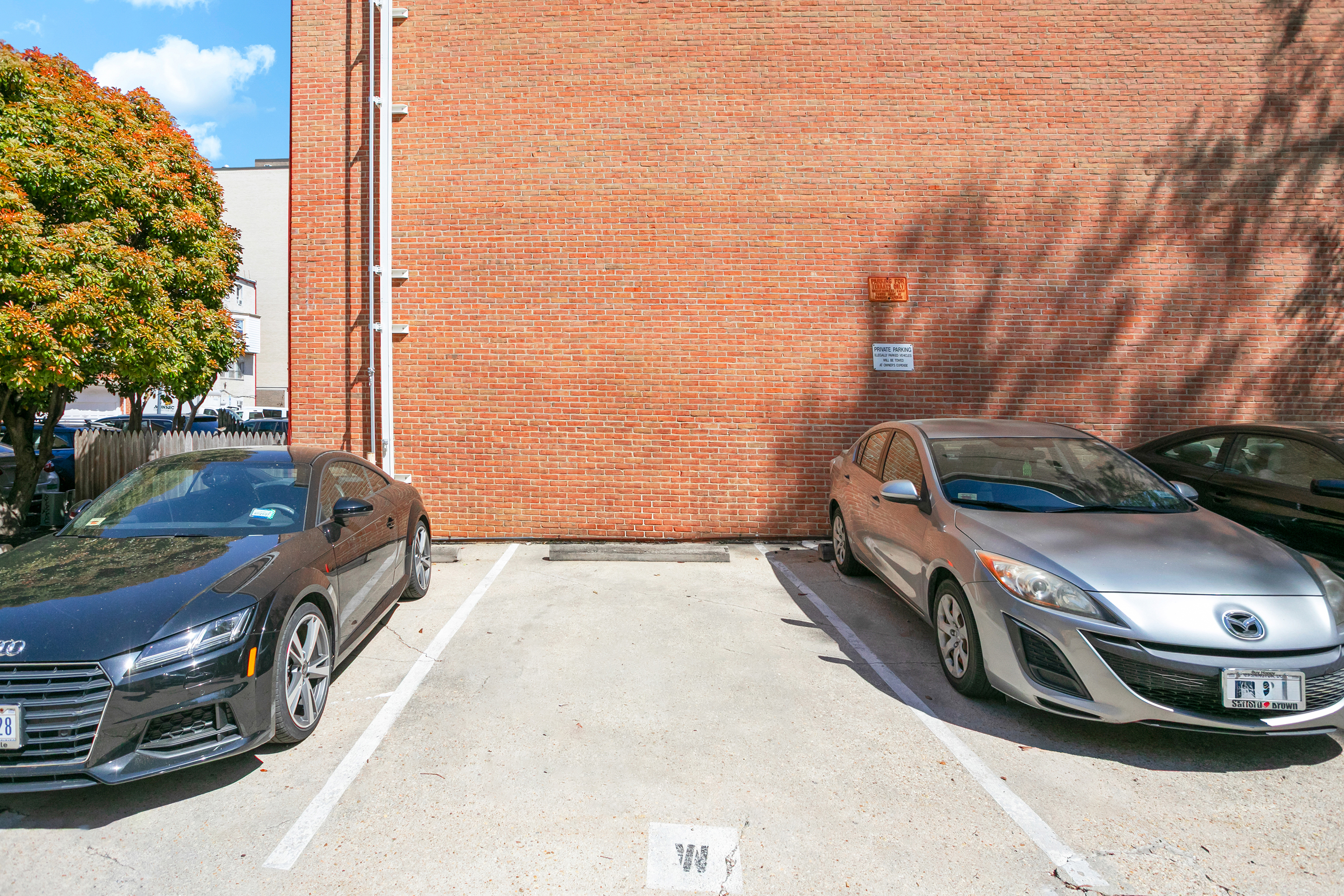 1832 Corcoran Street Northwest Washington, DC 20009 - Photo 23 of 29 a car parked on the side of the road