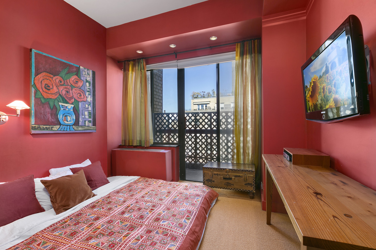 130 West 79th Street, Unit 17A Manhattan, NY 10024 - Photo 9 of 15 a bedroom with furniture and wooden floor