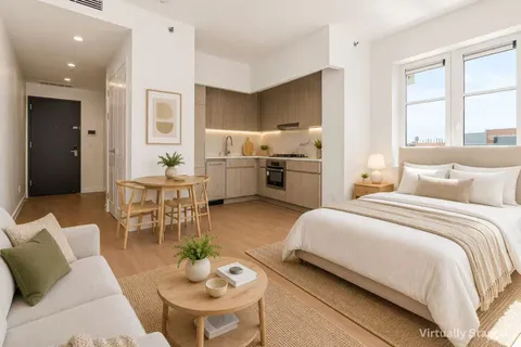 a bedroom with a bed and furniture