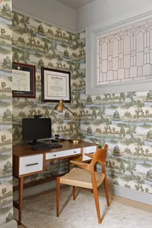 a view of a workspace with furniture