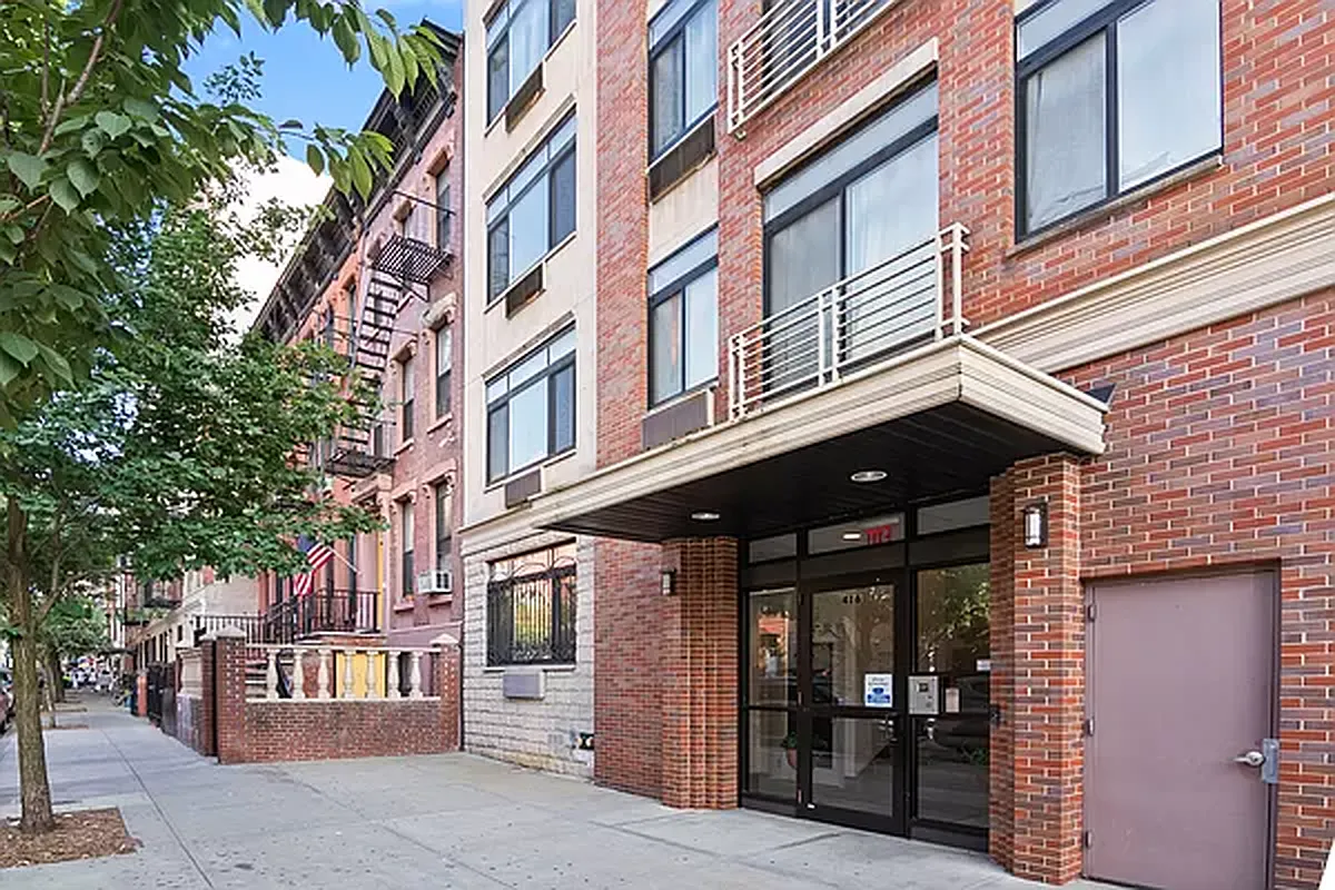 416 East 117th Street, Unit PH6 Manhattan, NY 10035 - Photo 19 of 20 a view of a building with a large windows