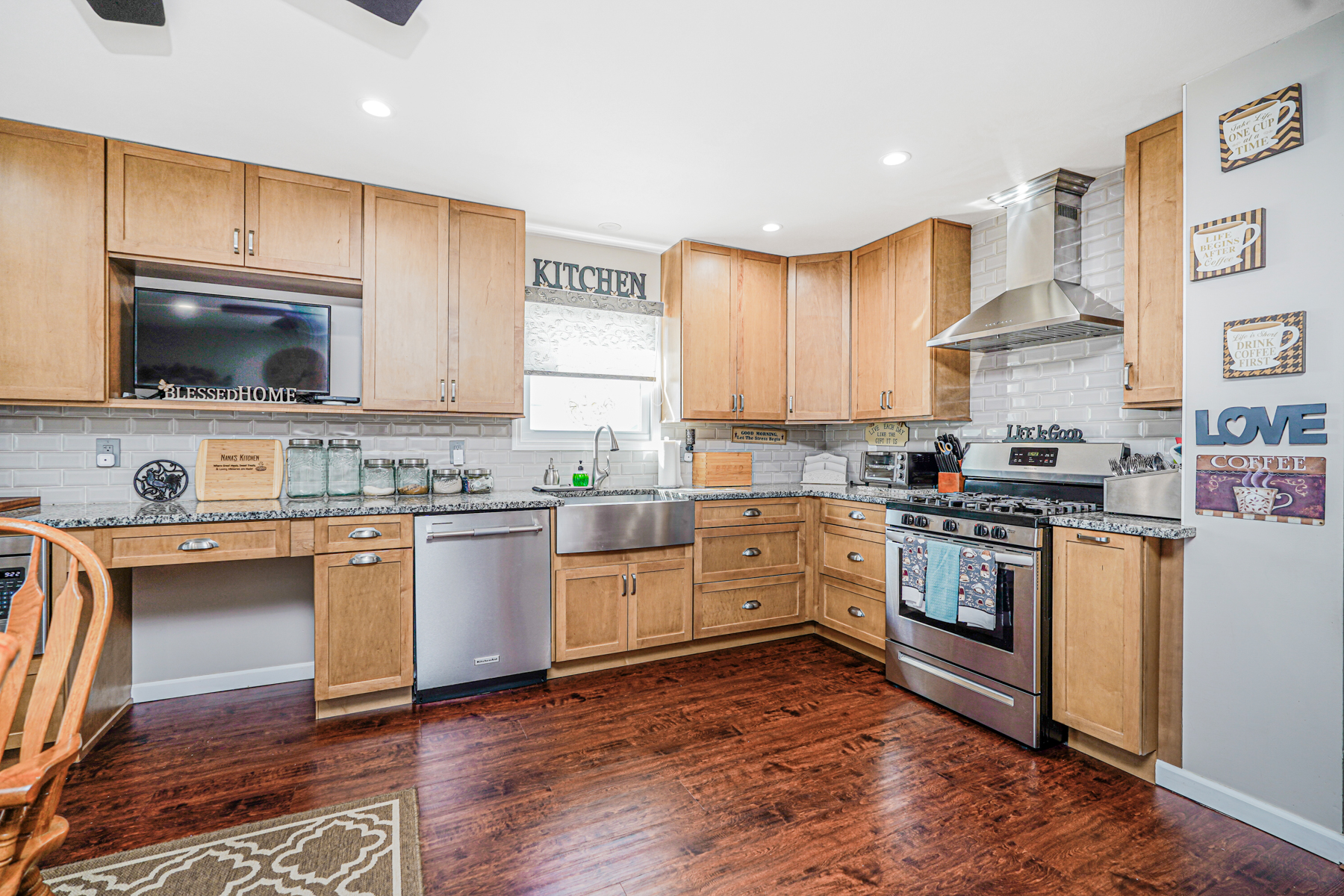 287 Greaves Avenue Staten Island, NY 10308 - Photo 7 of 35 a kitchen with stainless steel appliances granite countertop a stove top oven a sink dishwasher and a refrigerator