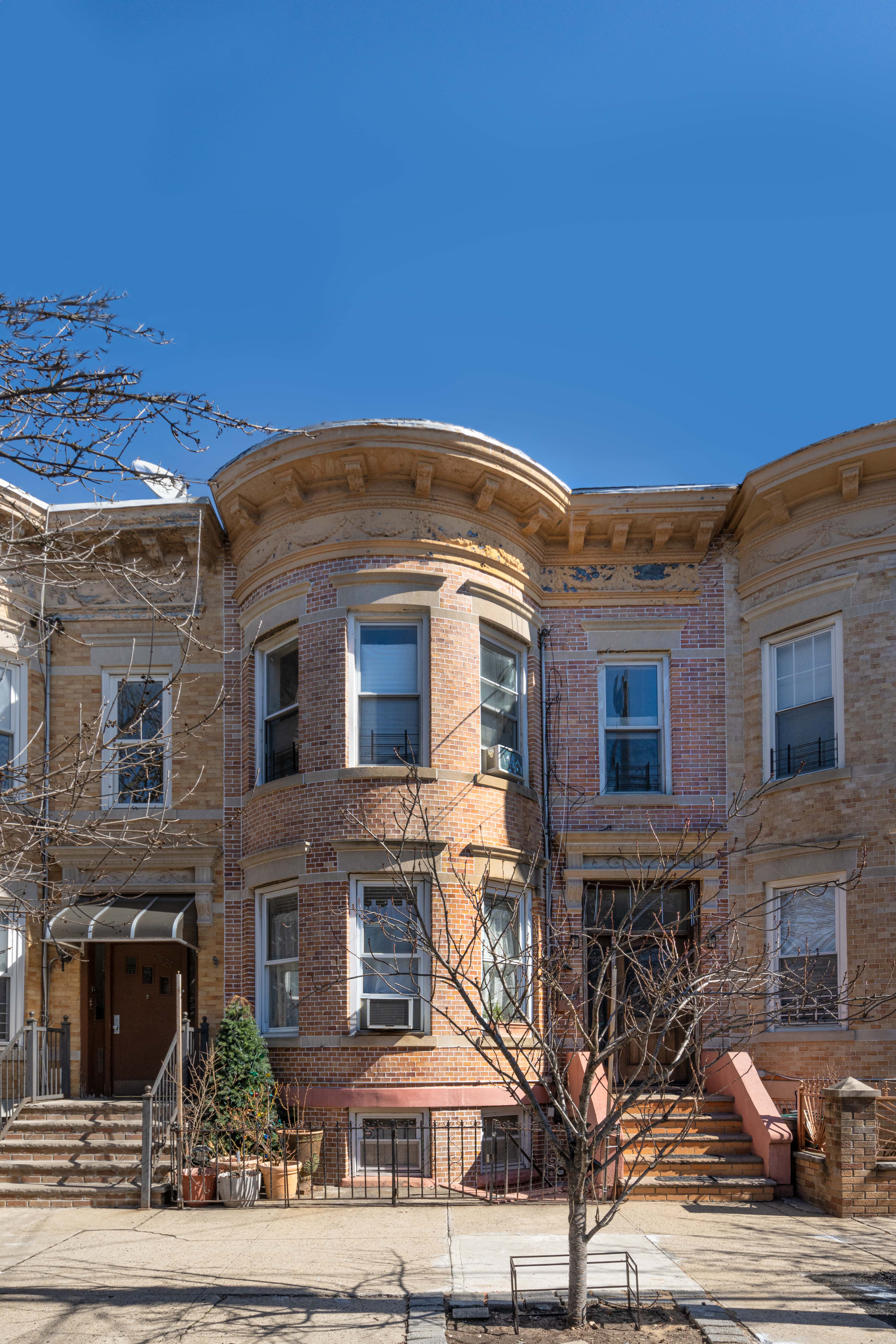 a front view of a building with street