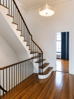 a view of entryway with wooden floor