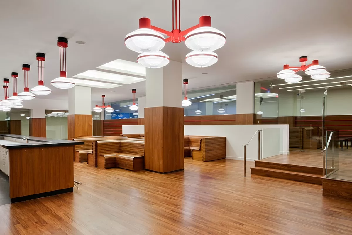 60 Riverside Boulevard, Unit 2004 Manhattan, NY 10069 - Photo 16 of 18 a kitchen with stainless steel appliances granite countertop a stove and a wooden floors