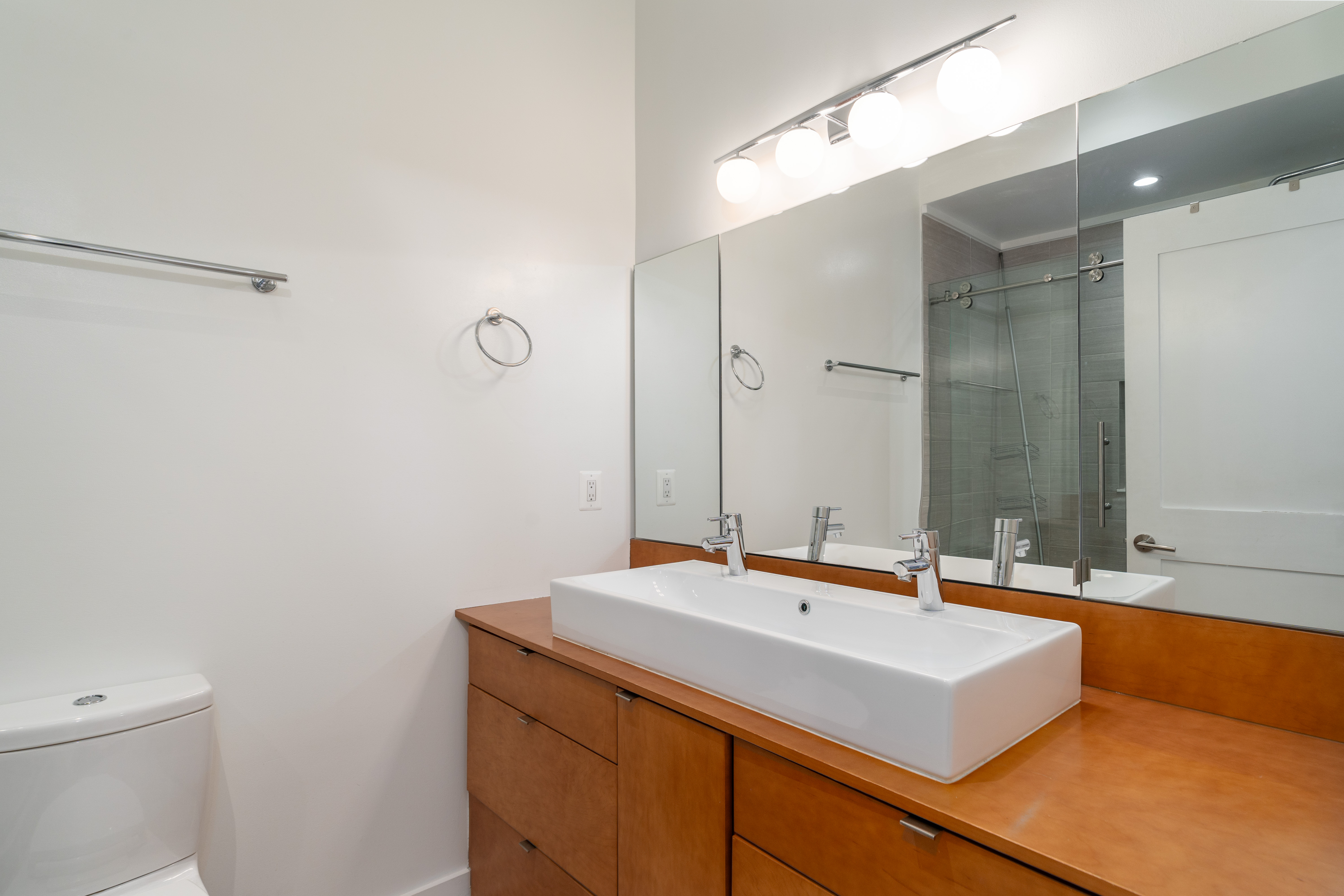 1740 New Jersey Avenue Northwest, Unit 2 Washington, DC 20001 - Photo 17 of 35 a bathroom with a sink and a mirror