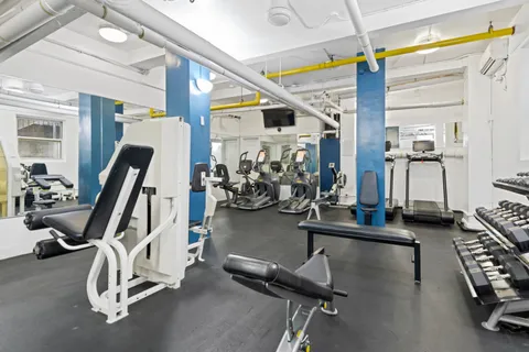 a view of a room with gym equipment