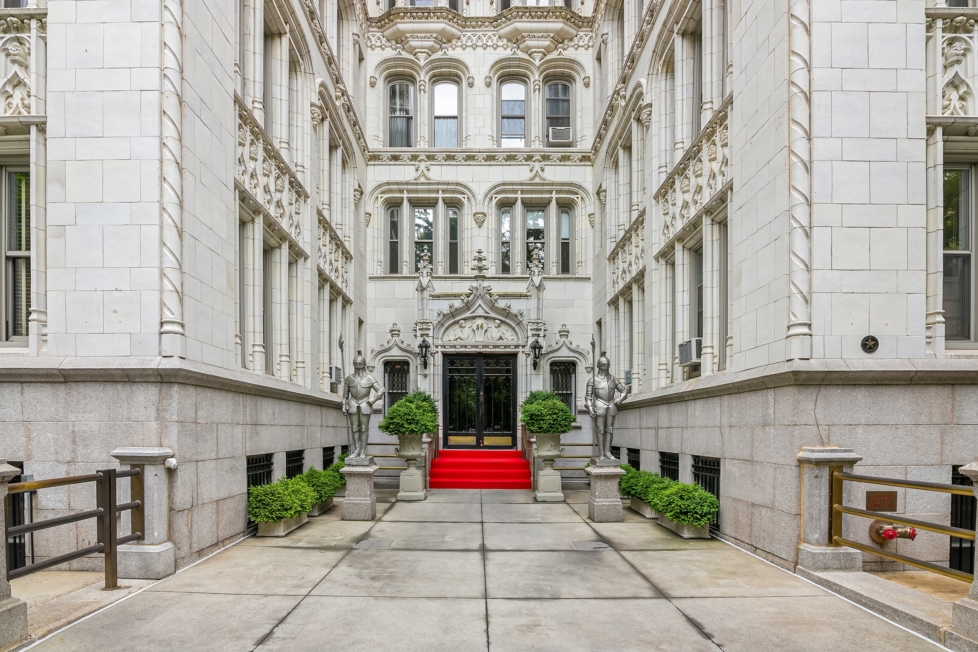 36 Gramercy Park East, Unit 5W Manhattan, NY 10003 - Photo 10 of 12 a building with potted plants in front of it