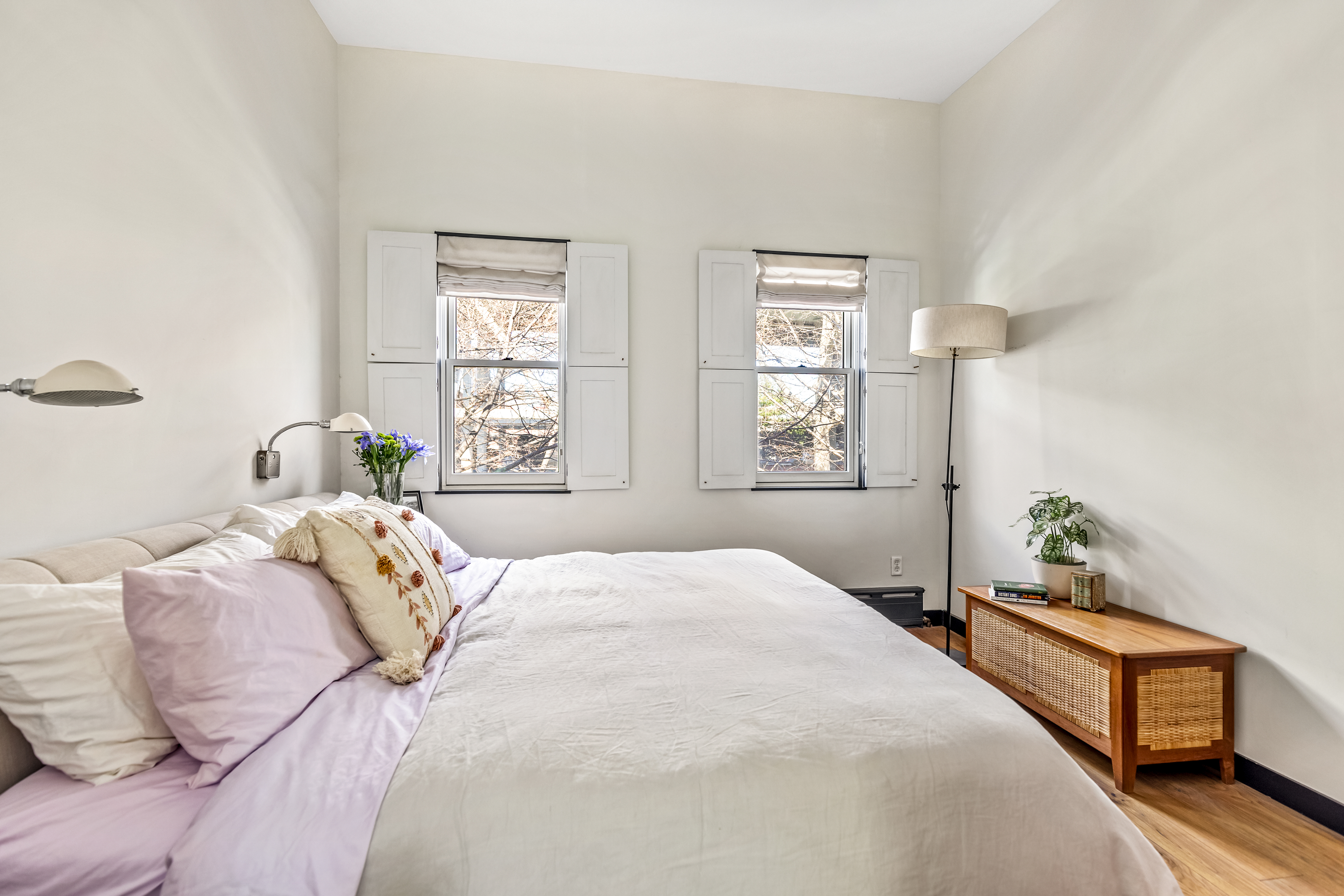 162 10th Street Brooklyn, NY 11215 - Photo 7 of 13 a bedroom with a bed and window