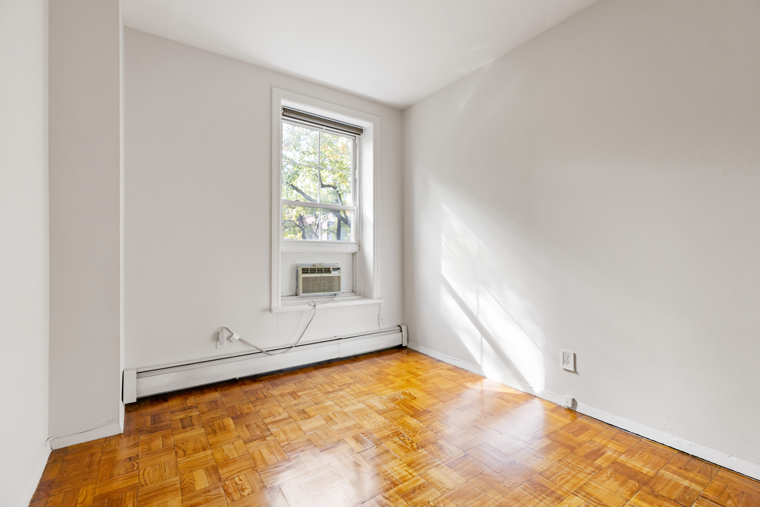 136 East 30th Street, Unit 3R Manhattan, NY 10016 - Photo 20 of 23 an empty room with windows